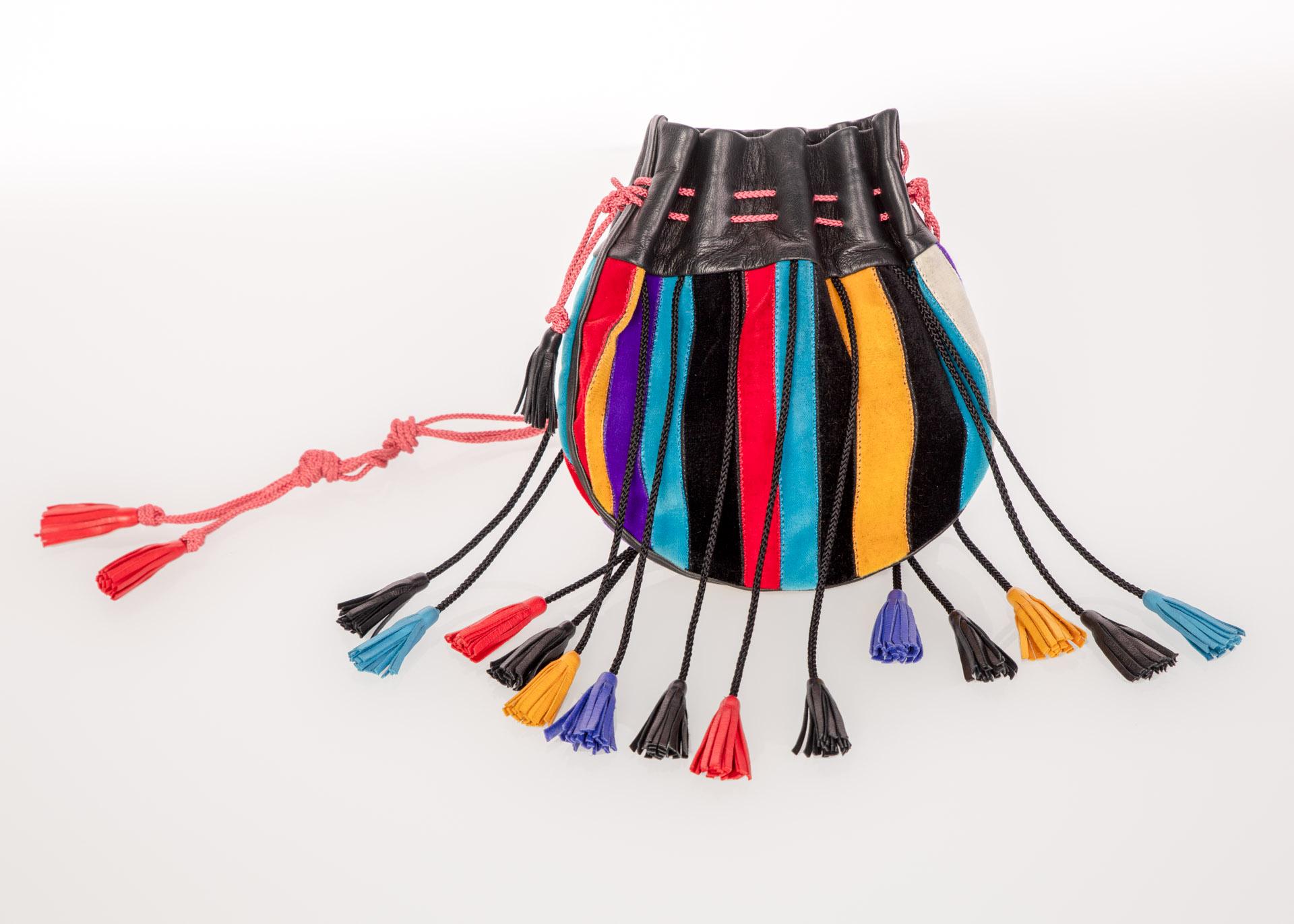 Notably involved in several art scenes internationally, at times, these influences from different movements can be seen in Saint Laurent work. In this 1970s multi-color crossbody, the color combination is in line with the rich hues of pop art style.