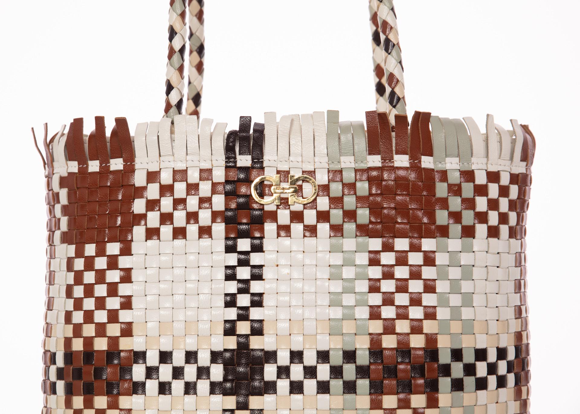 Salvatore Ferragamo Multicolor Woven Shoulder bag. 
Brown, ivory, creme, sage green and black  woven leather shoulder and shopper tote bag with gold-tone Gancini accent at front face, dual rolled handles, black jacquard interior lining, single