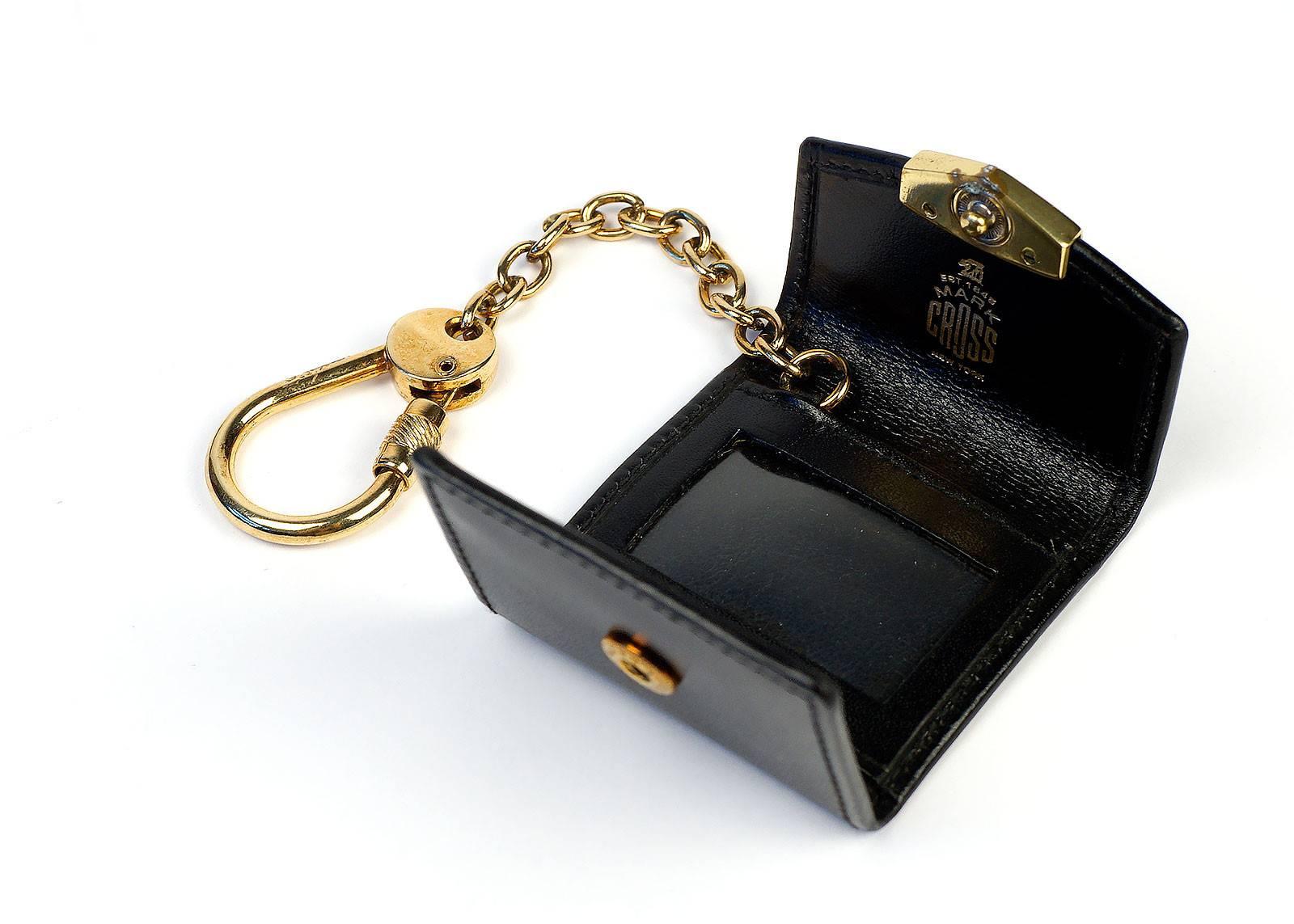 Mark Cross mini black key ring/ leather photo holder with rolling closure. 

-Measurements-
length:1.5"
height:1.5"

Condition: New, Never Used