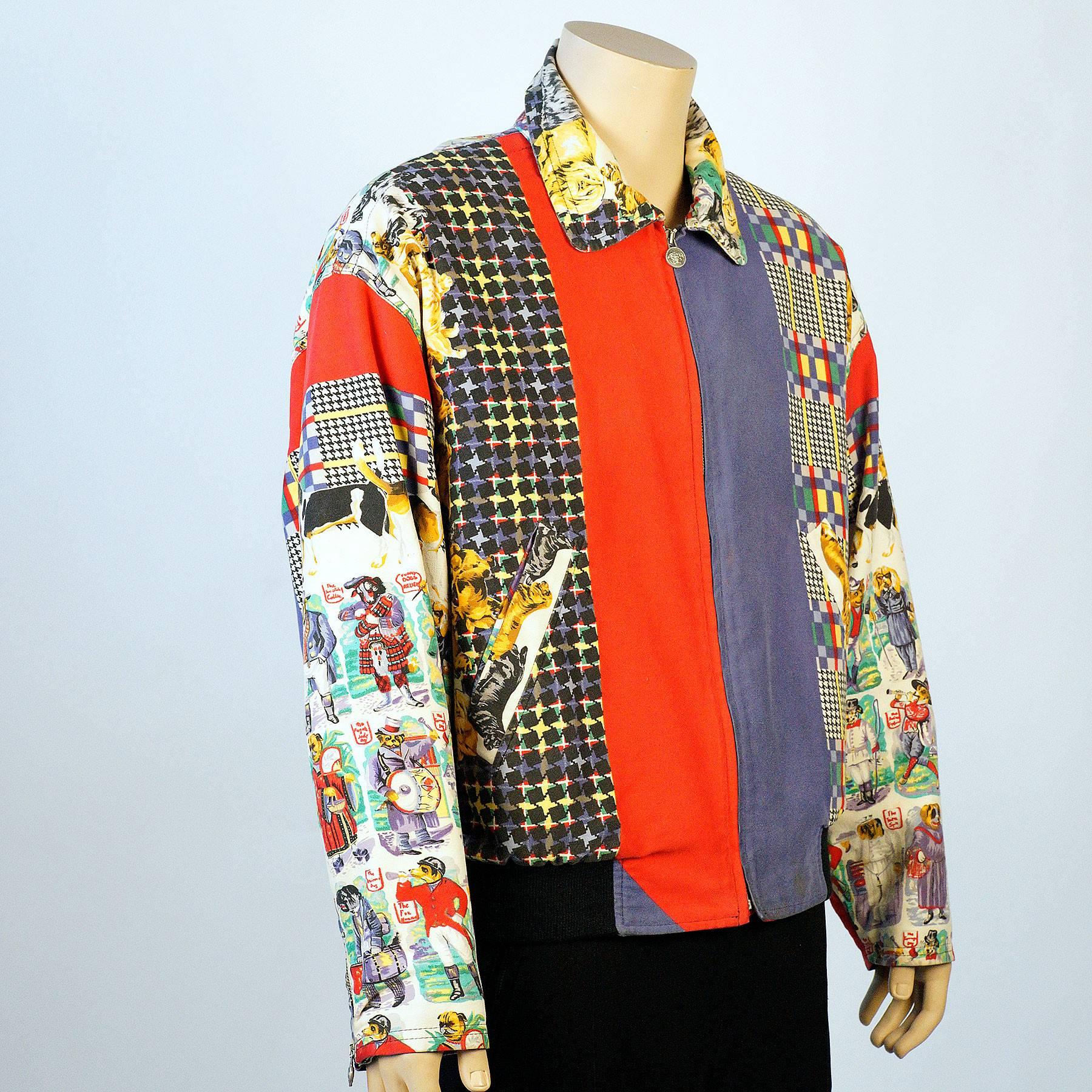 Rare Versus (Versace) multi color dog print jacket with drop shoulders and a silver medusa head logo zipper up.

Made In Italy.
Size: Tag marked Large 

-Measurements-
Sleeve length:22