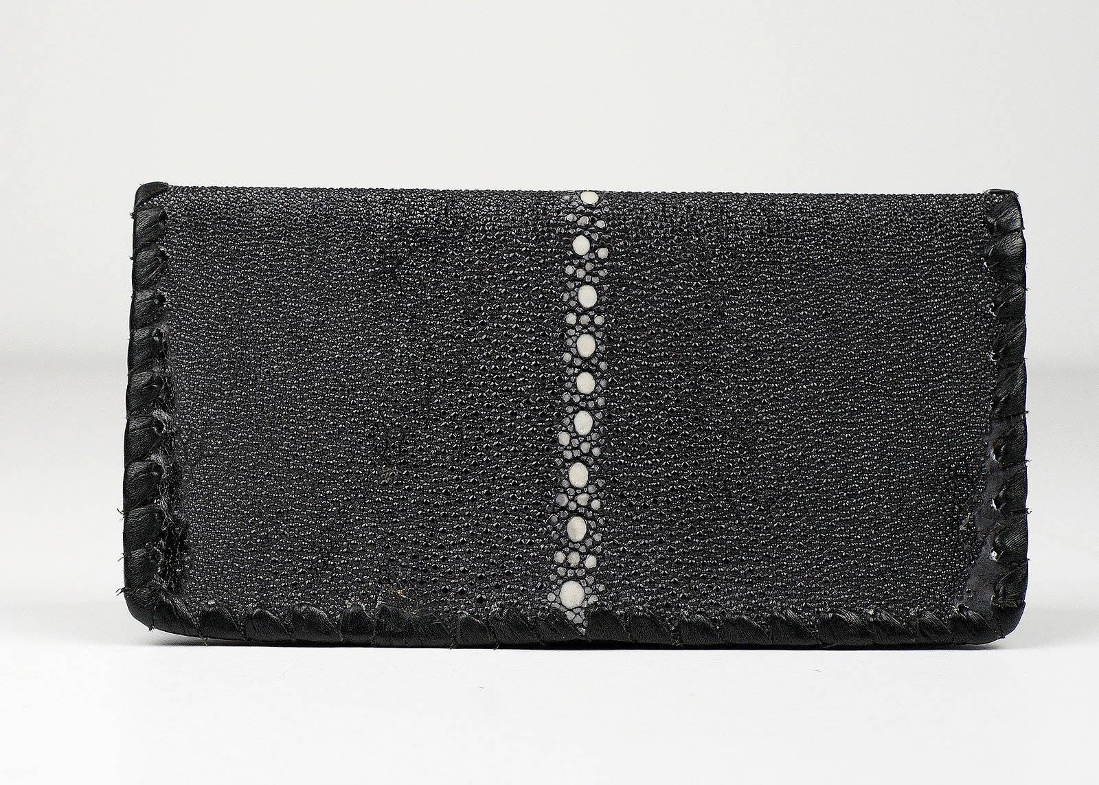 Artisan crafted black stingray leather custom made wallet.

Measurements: 7 inches tall, 3 inches wide 

New Condition: This wallet is new and was never used.