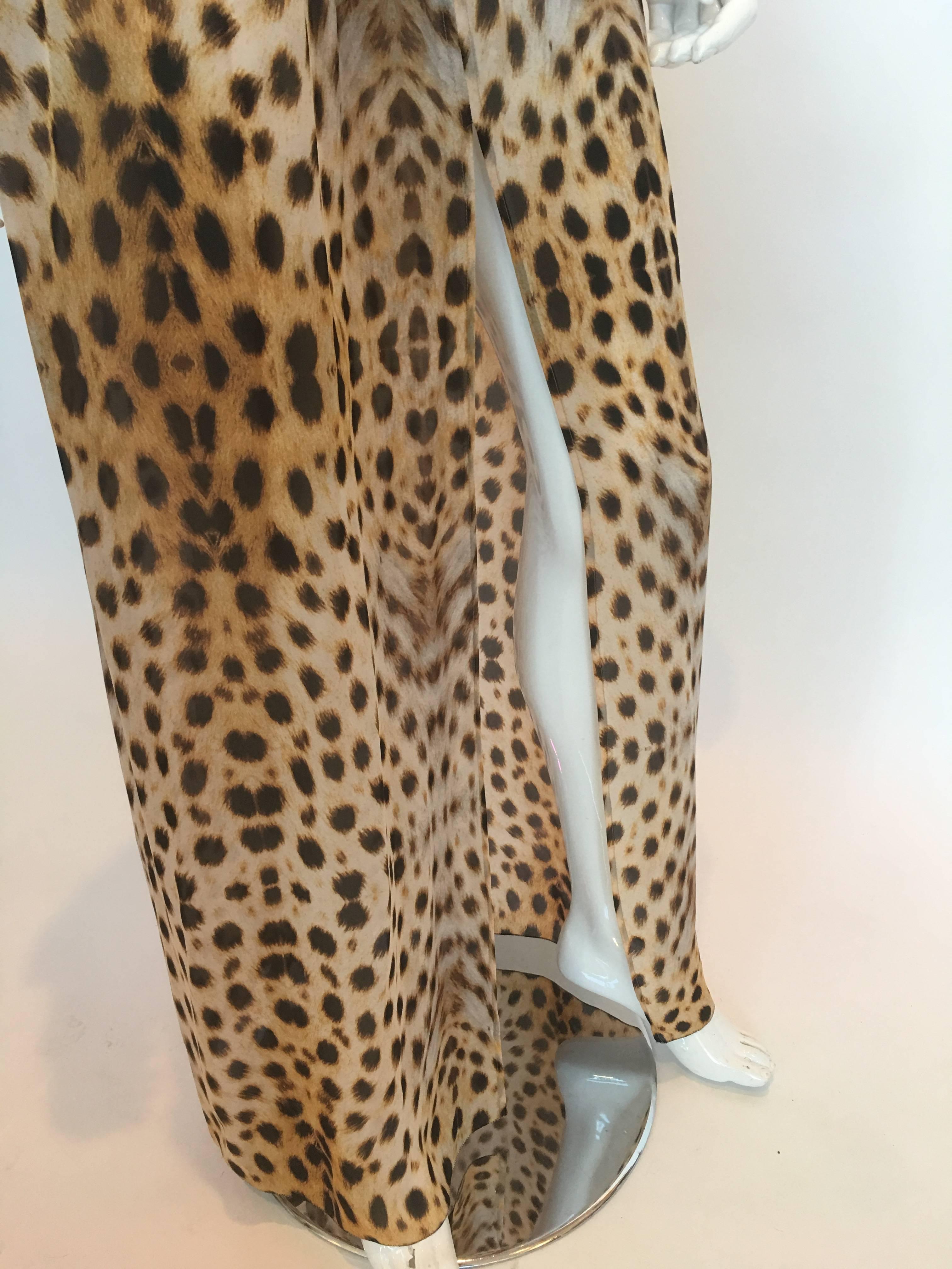 Roberto Cavalli Silk Leopard Print Dress

Made in Italy 
Size 40

Shoulders - seam to seam: 27"
Sleeve length - shoulder to hem: 13.5"
Armpit to armpit: 21"
Bust: 25"
Waist: 13.5" MAX stretch 22"
Hip: 22"
Length -