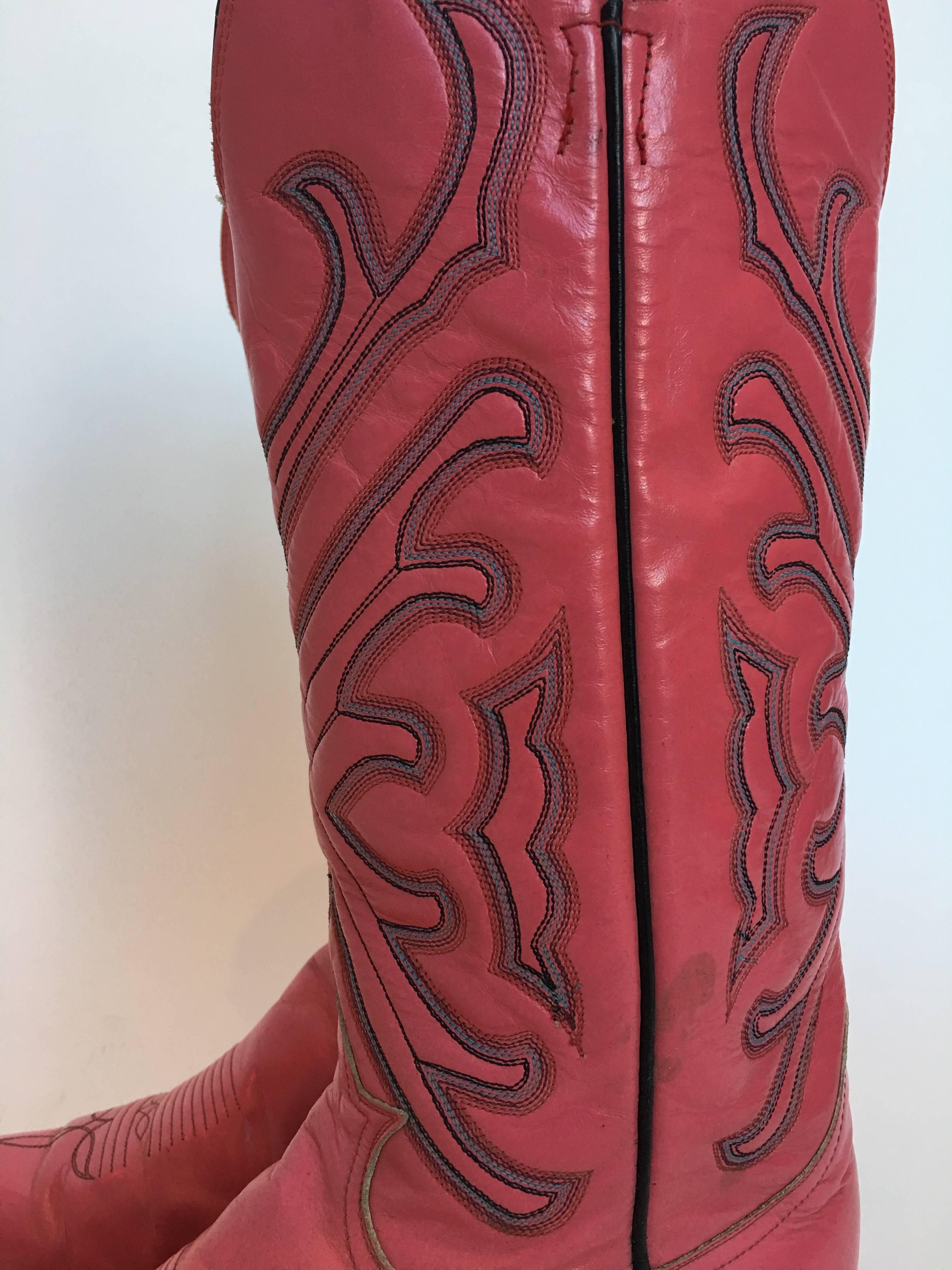 Tony Lama Vintage Pink Cowboy Boots

Size not marked

Measurements
Toe to heel: 11.5
Sole width: 3.75

Good Vintage Condition:Please remember all clothes are previously owned and gently worn unless otherwise noted.  ALL SALES FINAL. No refunds or