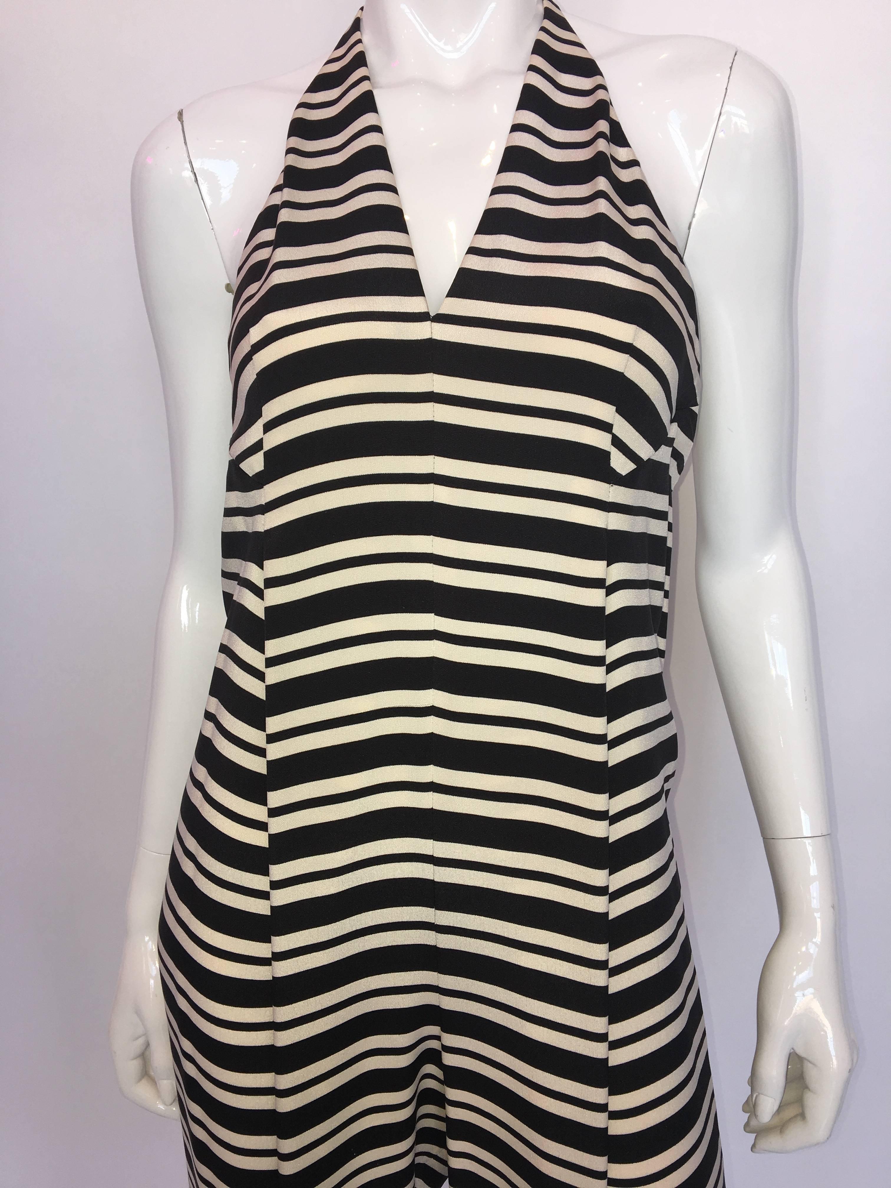 1970s Geoffrey Beene Black & White Striped Halter Neck Jumpsuit
Unsure of fabric content - most likely silk

Measurements (taken flat):
Neck (circumference): 25