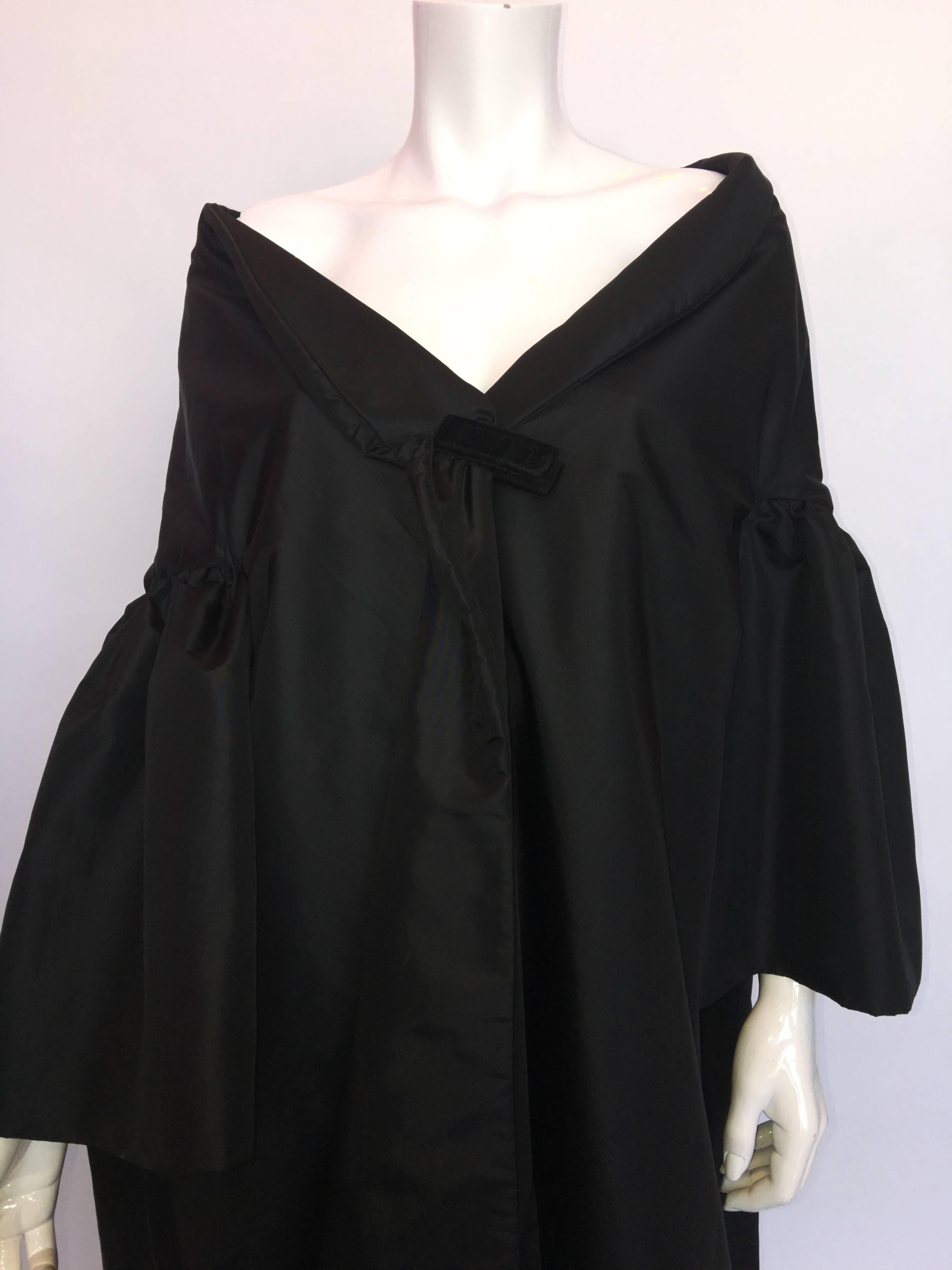 1980s Victor Costa for Saks 5th Ave Formal Black Opera Coat; off shoulder style
Size Label: S
Made in USA
Fabric: Nylon/Dacron blend

Measurements (taken flat):
Shoulders - seam to seam: 26