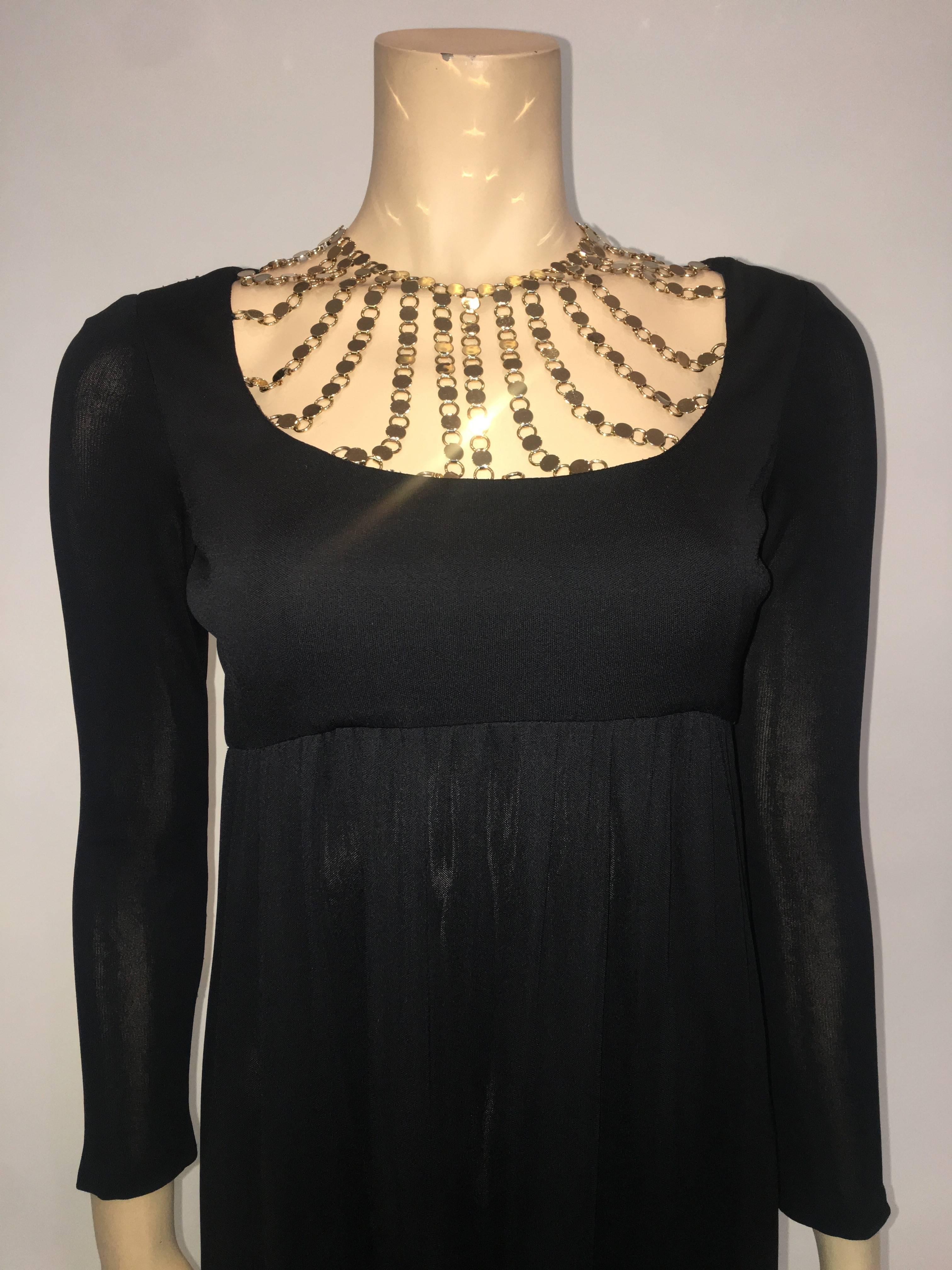 Jay Korbin for Maisonette 1960's Black Matte Jersey Long Dress with Gold Chain Neckline and Empire Waistline

Measurements : *ALL MEASUREMENTS TAKEN FLAT*
Shoulders : 13.5