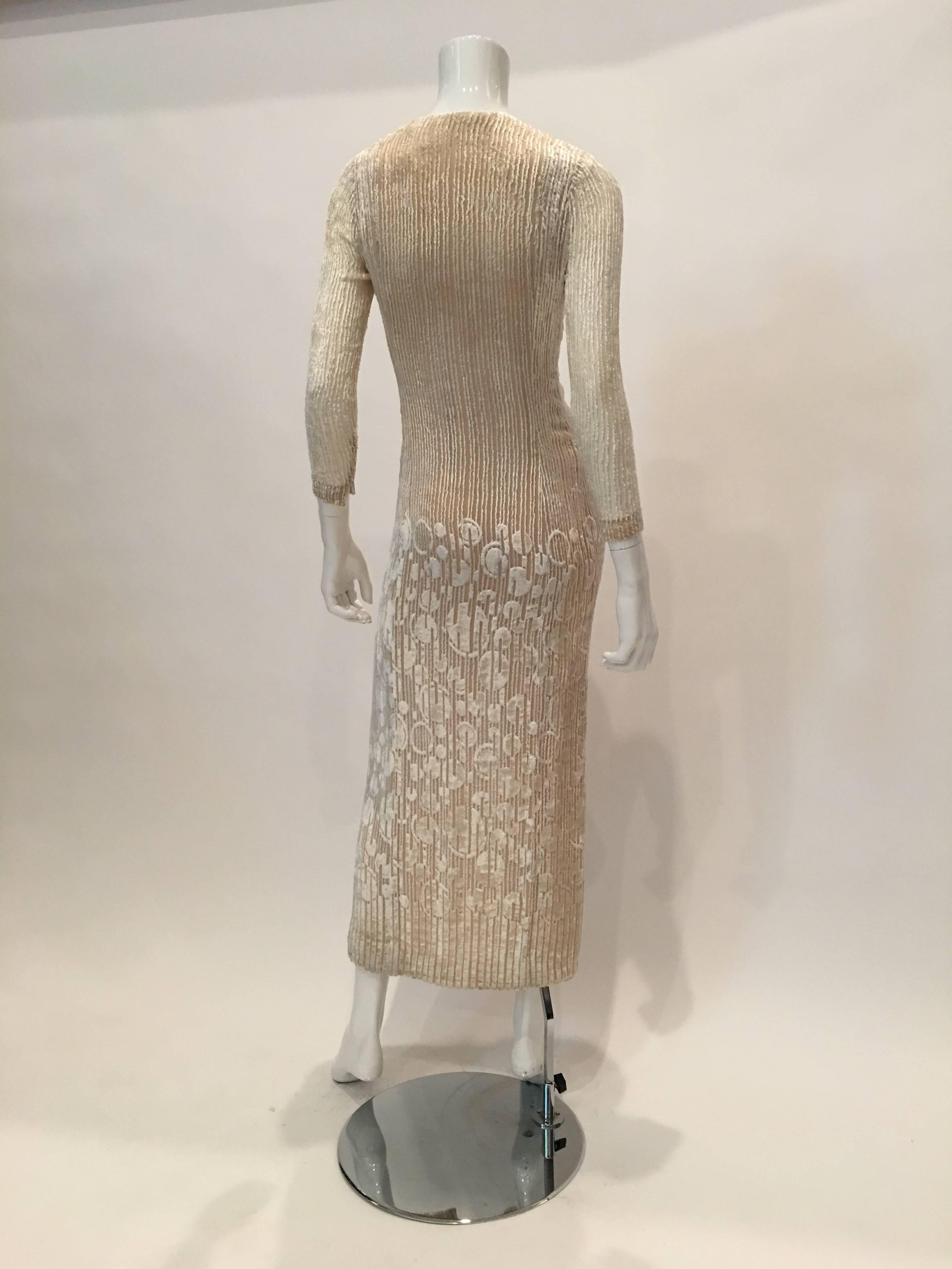 Pauline Trigere 1970's Ivory Cut Velvet Button Front Long Dress with Nude Silk Lining and 8 Front Buttons

Measurements : *ALL MEASUREMENTS TAKEN FLAT* 
Mannequin size : 2-4 (Dress fits mannequin tightly)
Shoulders: 15