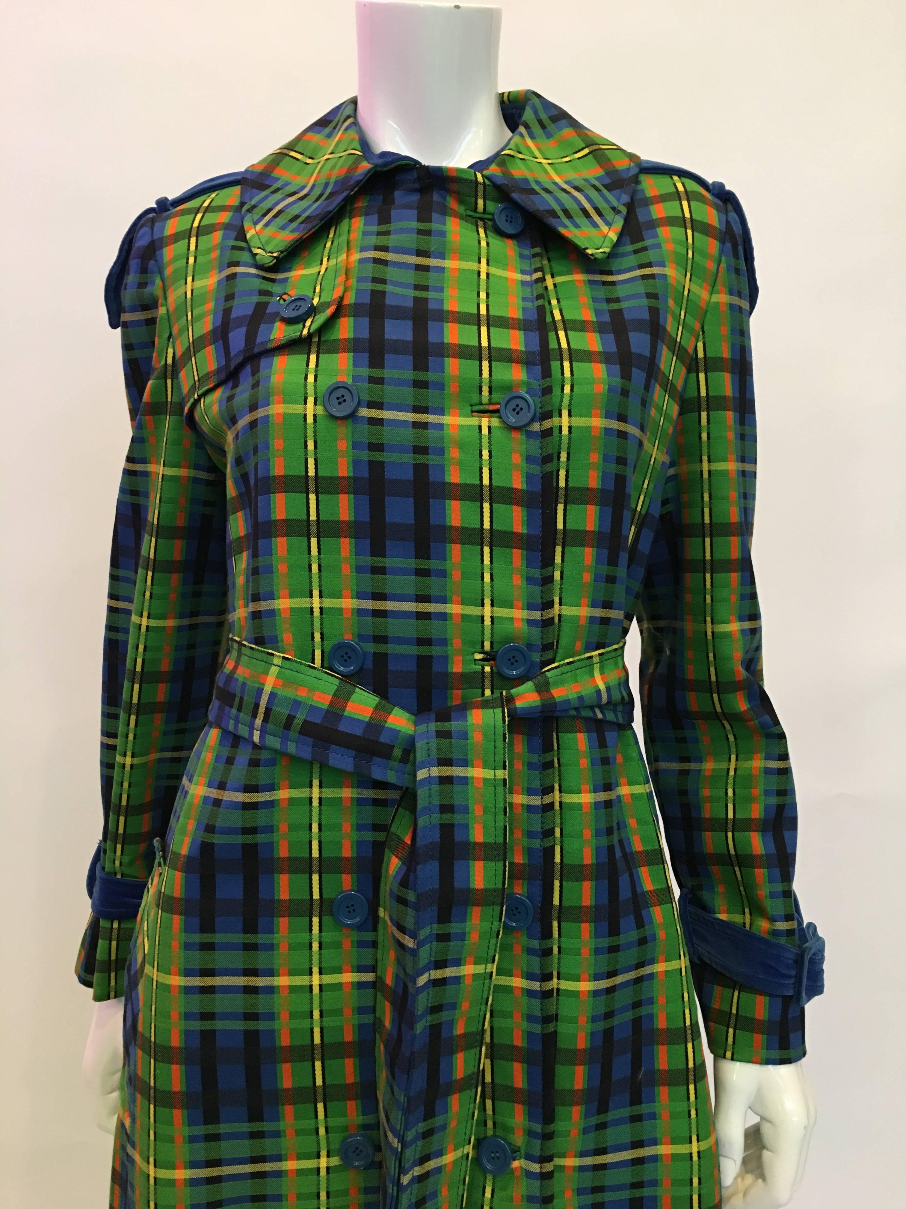 Estelle Allardale 1970's blue , yellow and green plaid double breasted maxi coat with blue velvet trim. 
Coat contains a tie belt and blue velvet adjustable strap closures around both wrists and also a slit opening on the back.

*All measurements