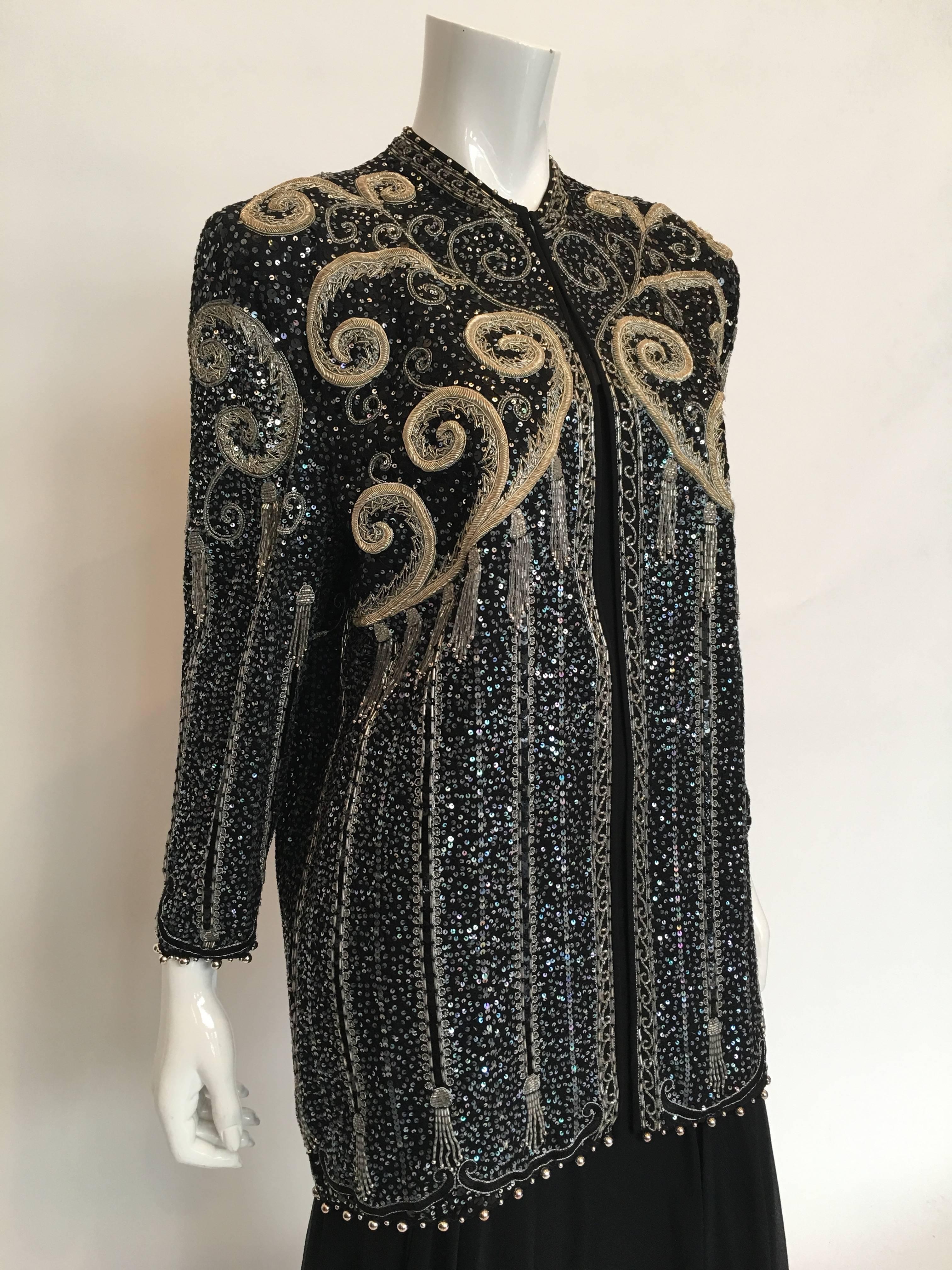 Zandra Rhodes 1980's Beaded and Sequined Jacket

*ALL MEASUREMENTS TAKEN FLAT*

Beaded Jacket:
Shoulder to shoulder - 17 inches
Sleeve (shoulder seam to wrist) - 21 inches
Armpit to armpit - 20 inches 
Bust - 40 inches
Total Length - 32 inches