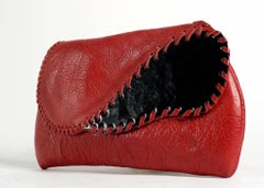 Red Leather Whip Stitched Enamel Clutch, circa 1980