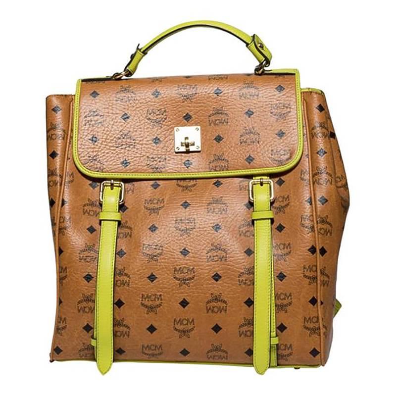 MCM Stark Side Stud Leather Backpack with flop opening, buckle closure and top handle.

Signed: 