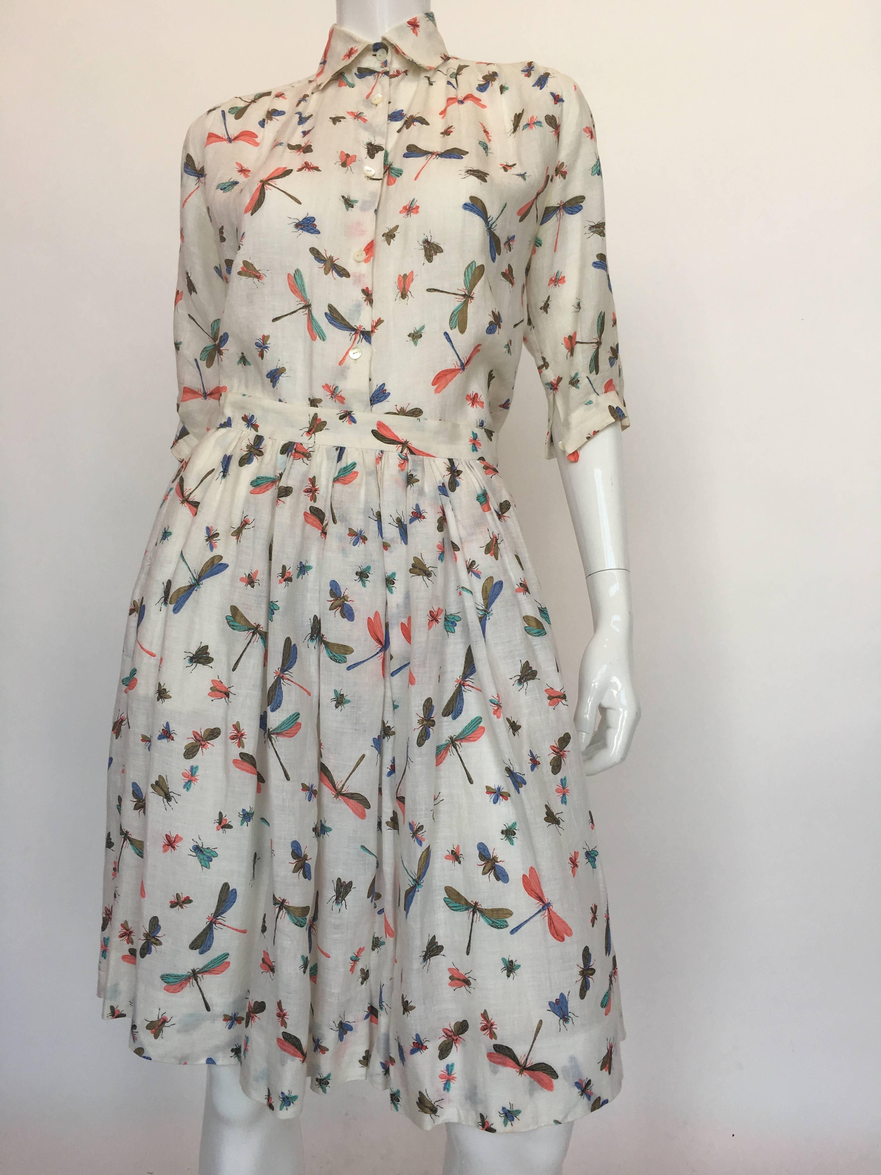 Authentic 1980s Gucci Linen 2 Piece Dragonfly Print Skirt/Skirt Set
Size marked: Euro 44

Shirt:
Shoulder seam to shoulder seam: 16