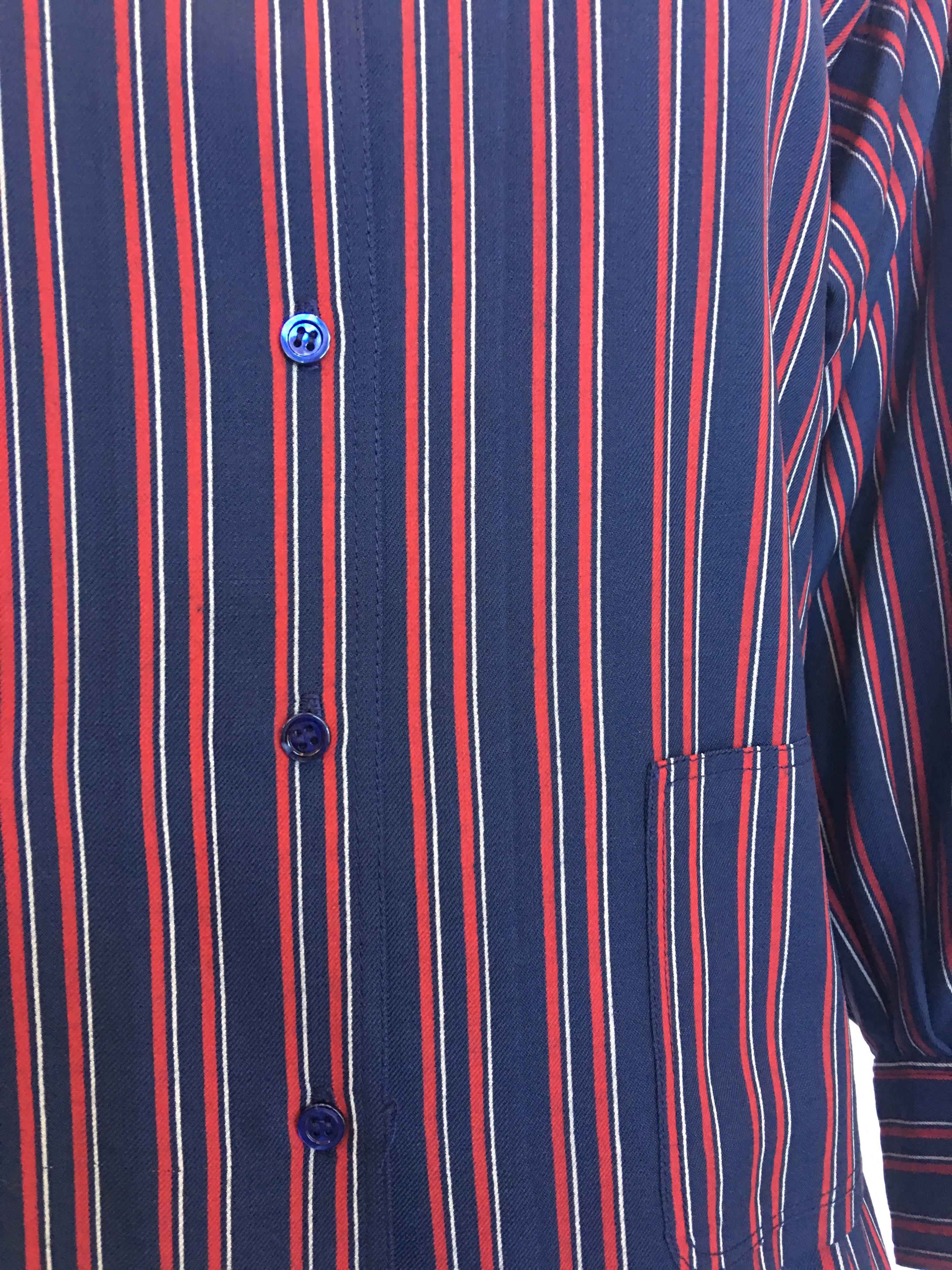 1970s Saint Laurent Blue & Red Striped Wool 2 piece Skirt Set

Made in France
Size Label - 34

All measurements (taken flat):
Shirt:
Shoulders - seam to seam: 16