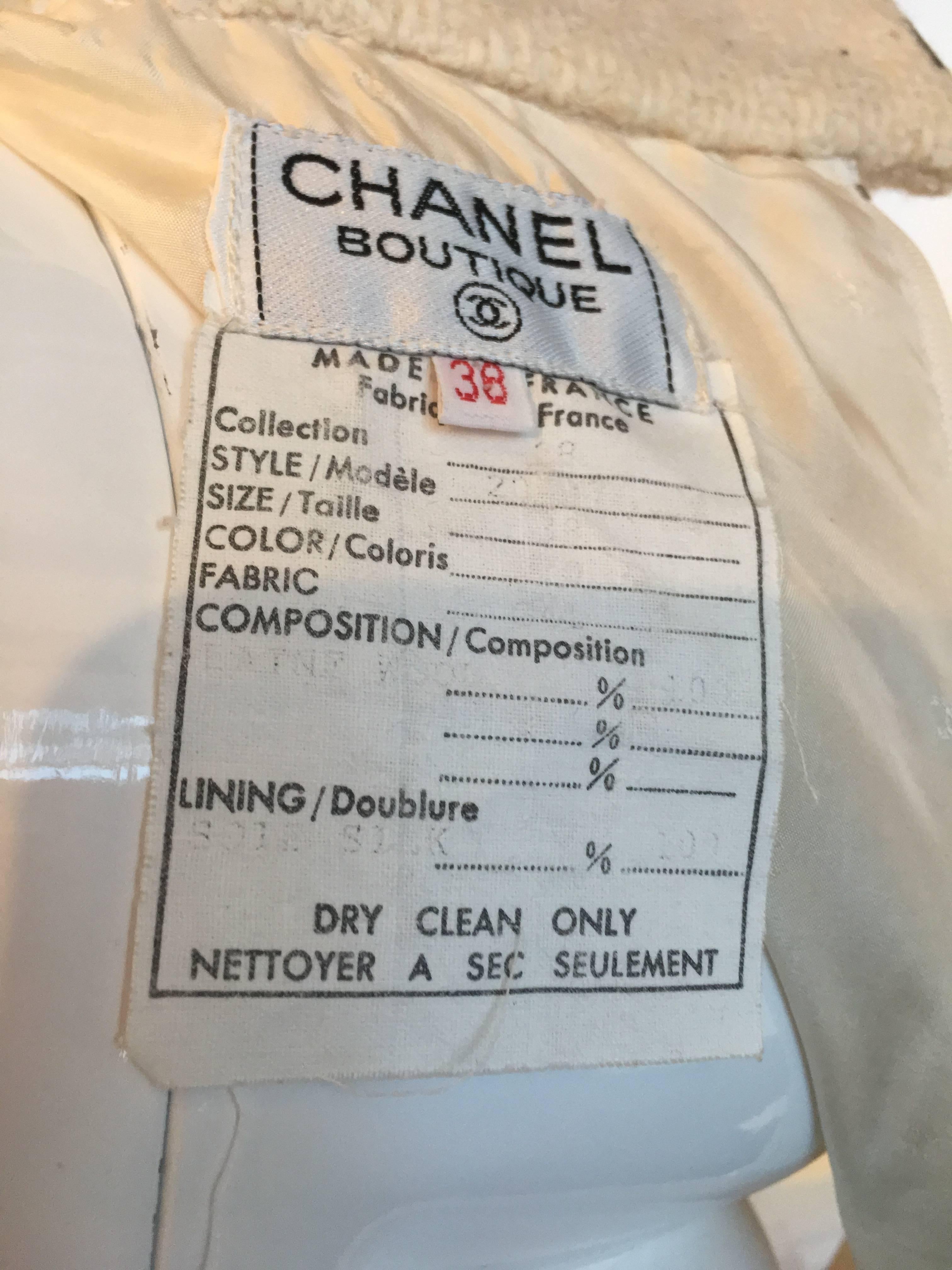 1980's Chanel Cream Colored Wool Tweed Skirt

Measurements - taken flat:
Waist: 13
