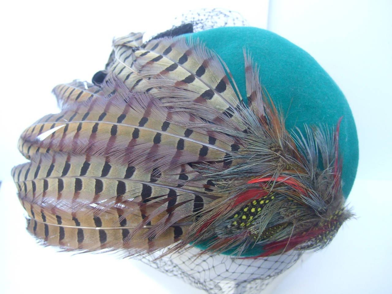 Dramatic Green Felt Feather Veiled Hat c 1980s 1
