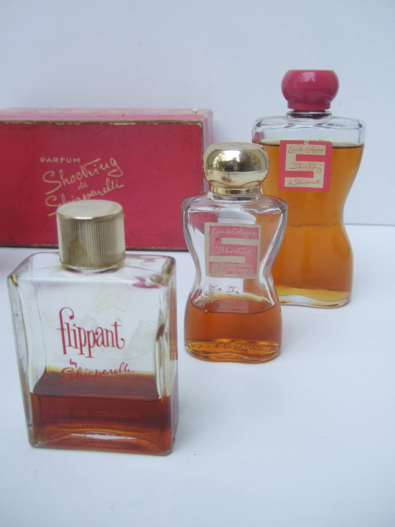 Pink Schiaparelli Collection of Vintage Perfume Bottles c 1950s