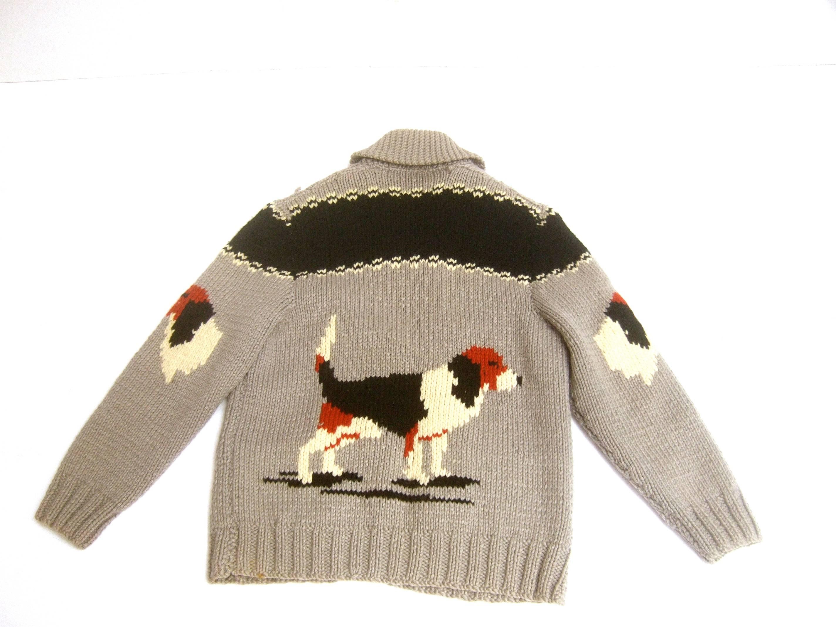 1940s Men's dog theme wool hand knit zippered sweater
The unique wool hand knit midcentury cardigan sweater 
is illustrated with a pair of spaniels on the front

The sleeves and back side also depict spaniels 
The heavy gauge wool hand knit cardigan