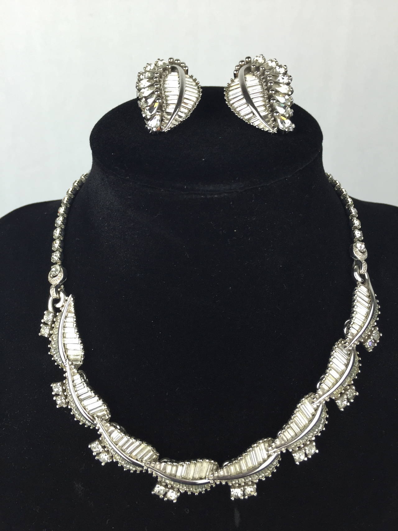 Women's Deco style 1950's Pennino necklace and earrings.