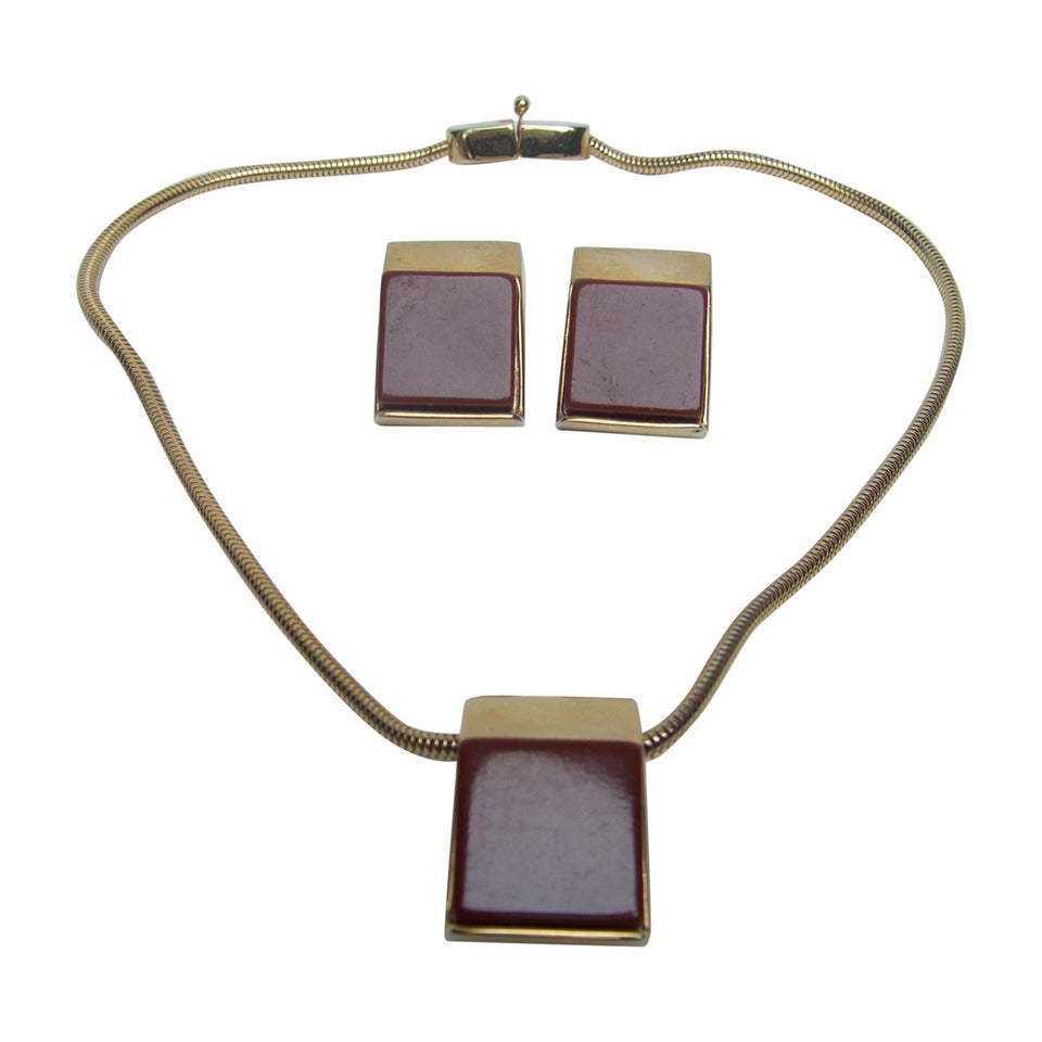 Pierre Cardin Sleek Cinnabar Resin Necklace & Earrings c 1970 For Sale