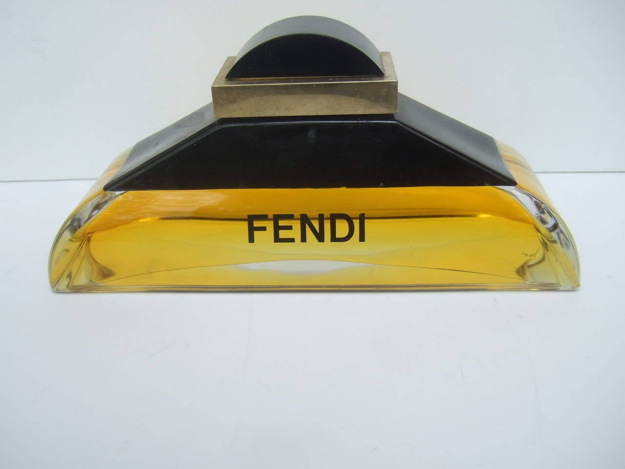 Fendi Large factice fragrance display replica bottle
The decorative dummy bottle is designed as a mock
display bottle for the fragrance

The lid & top section of the bottle are designed
with black & gold plastic. The lower section 
of