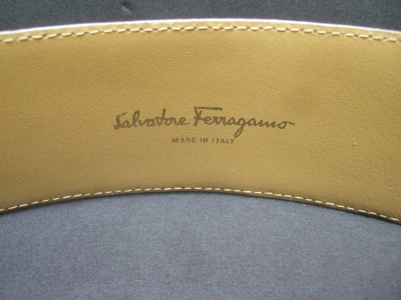 Salvatore Ferragamo Ivory Leather Dangling Gilt Metal Charm Belt c 1980s In Good Condition In University City, MO