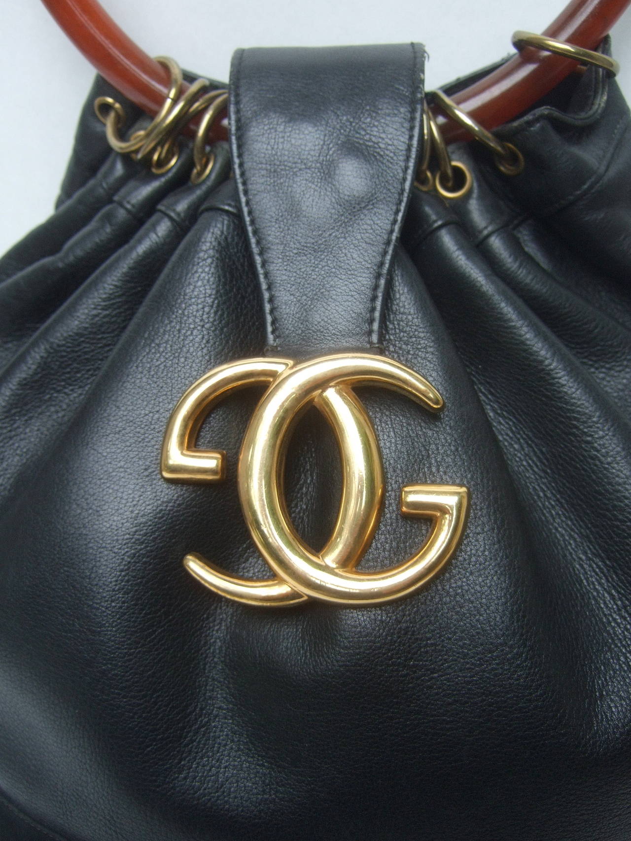 Gucci Rare 1970s Black Leather Handbag at 1stDibs