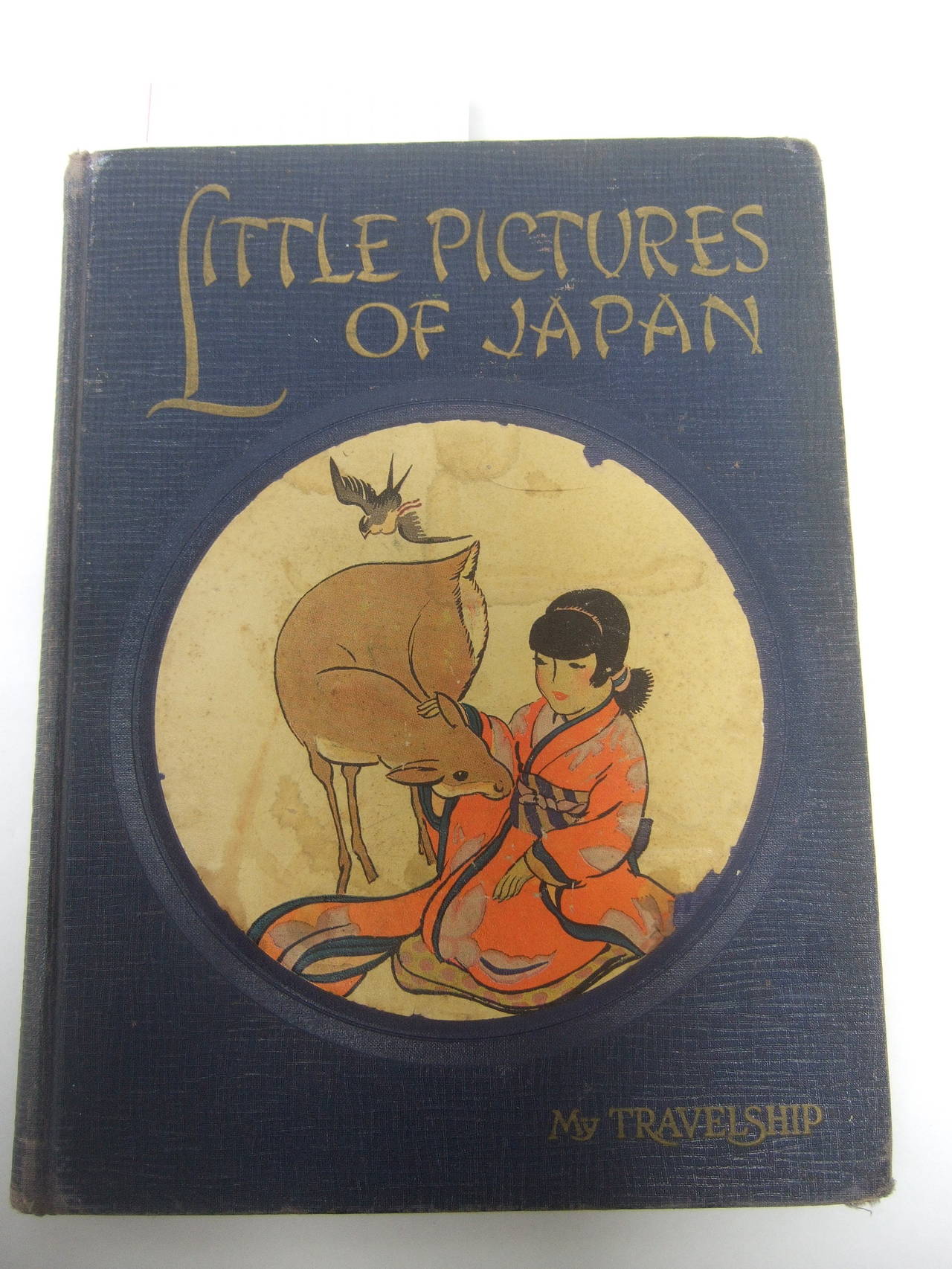 Little Pictures of Japan illustrated Childrens book Copyright 1925 
The vintage Child's theme book is illustrated with Japanese 
figures and iconography. The vibrant prints capture mothers
and children, warriors and geisha's, animals and