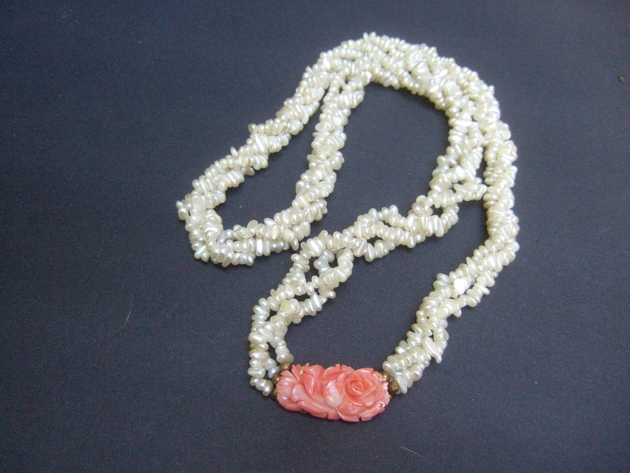 Opulent Freshwater Pearl Carved Coral Braided Necklace In Excellent Condition For Sale In University City, MO