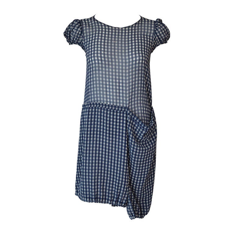 Early Comme des Garcons Dress graphic blue/white square printed sheer georgette with unusual seaming and doubled hems which form bellows when one walks. 
The ingenuity of early Japanese design with simple shapes in ornate cuts which transform with