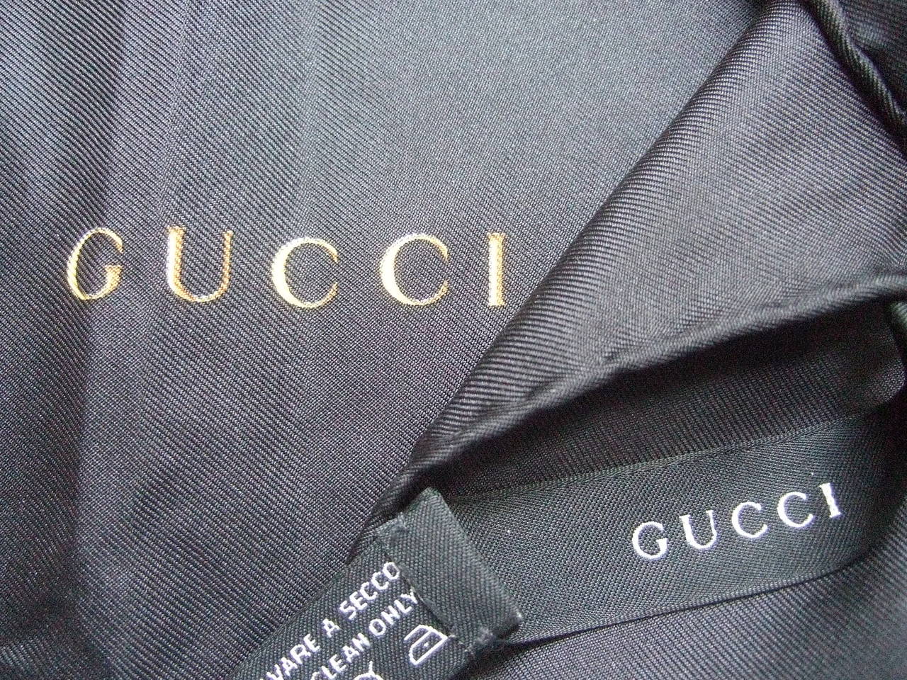 Gucci Italy Luxurious Black Silk Logo Scarf In Excellent Condition In University City, MO
