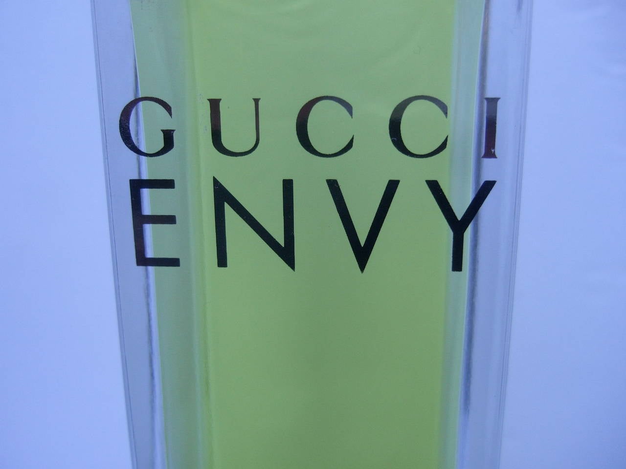 Gucci Sleek large factice display bottle
The large scale streamlined bottle is a replica of Gucci's "Envy" fragrance
The mock fragrance bottle makes a stylish decoration placed on a vanity or dressing room

The large scale replica