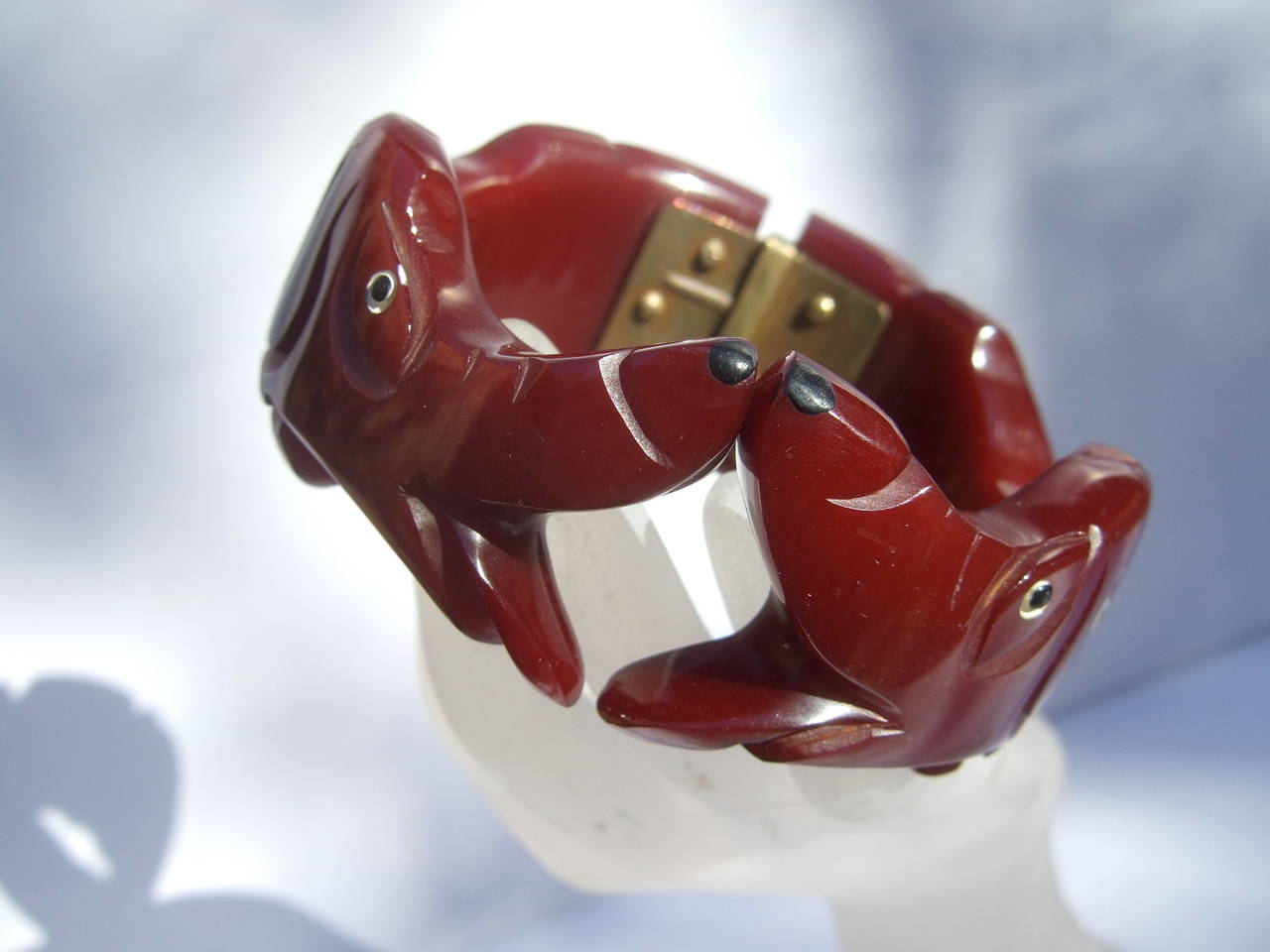 Spectacular Art Deco Carved Bakelite Hounds Hinged Bracelet c 1930s In Excellent Condition In University City, MO