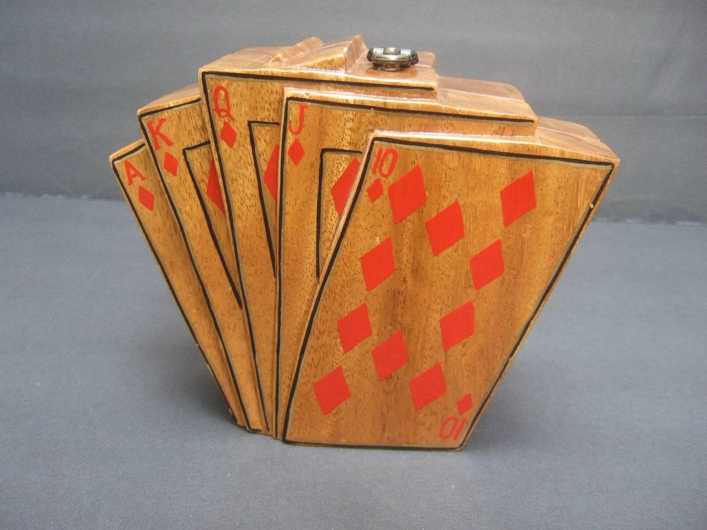 Timmy Woods Beverly Hills Unique playing card handbag c 1990's
The wood card theme artisan handbag is decorated with red 
enamel diamond cards in a flush sequence 

The handmade whimsical handbag is designed
with wood from fallen acacia trees