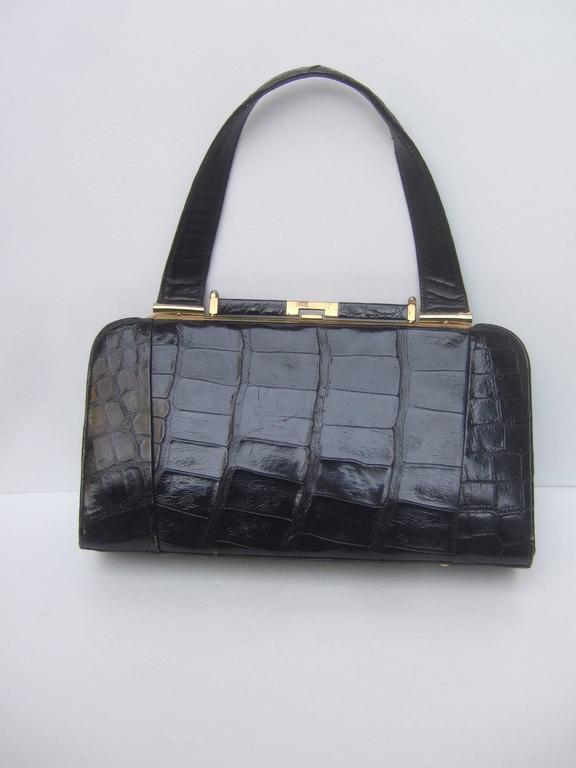 Sleek Ebony Alligator Vintage Handbag ca 1960 For Sale at 1stdibs