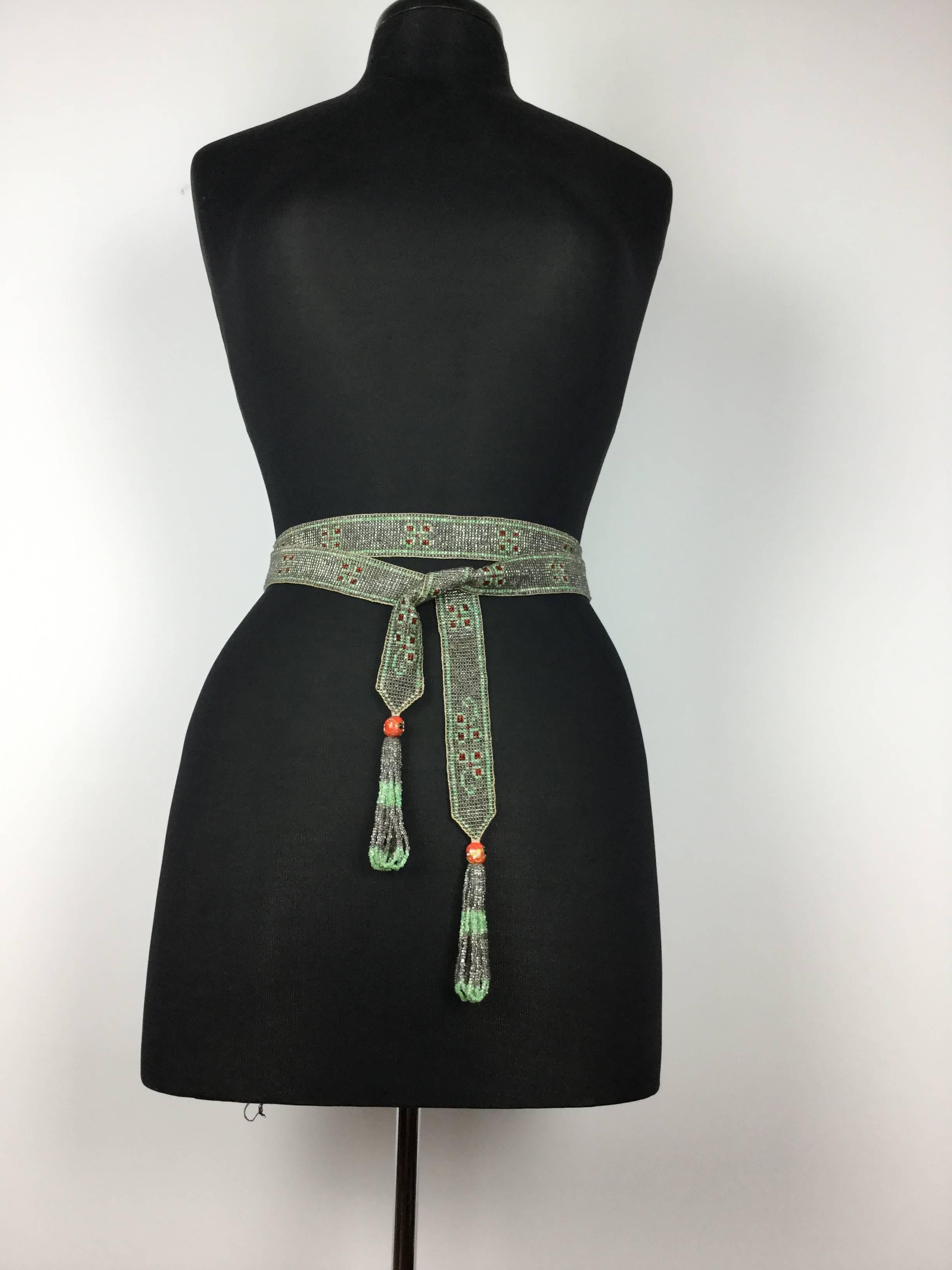 
Simply gorgeous woven Art Deco seed bead piece of the highest quality that can be worn in so many ways!

It's great as a belt either doubled over at the waist or worn low slung in a single 
knot. 

As a necklace is works both as a long