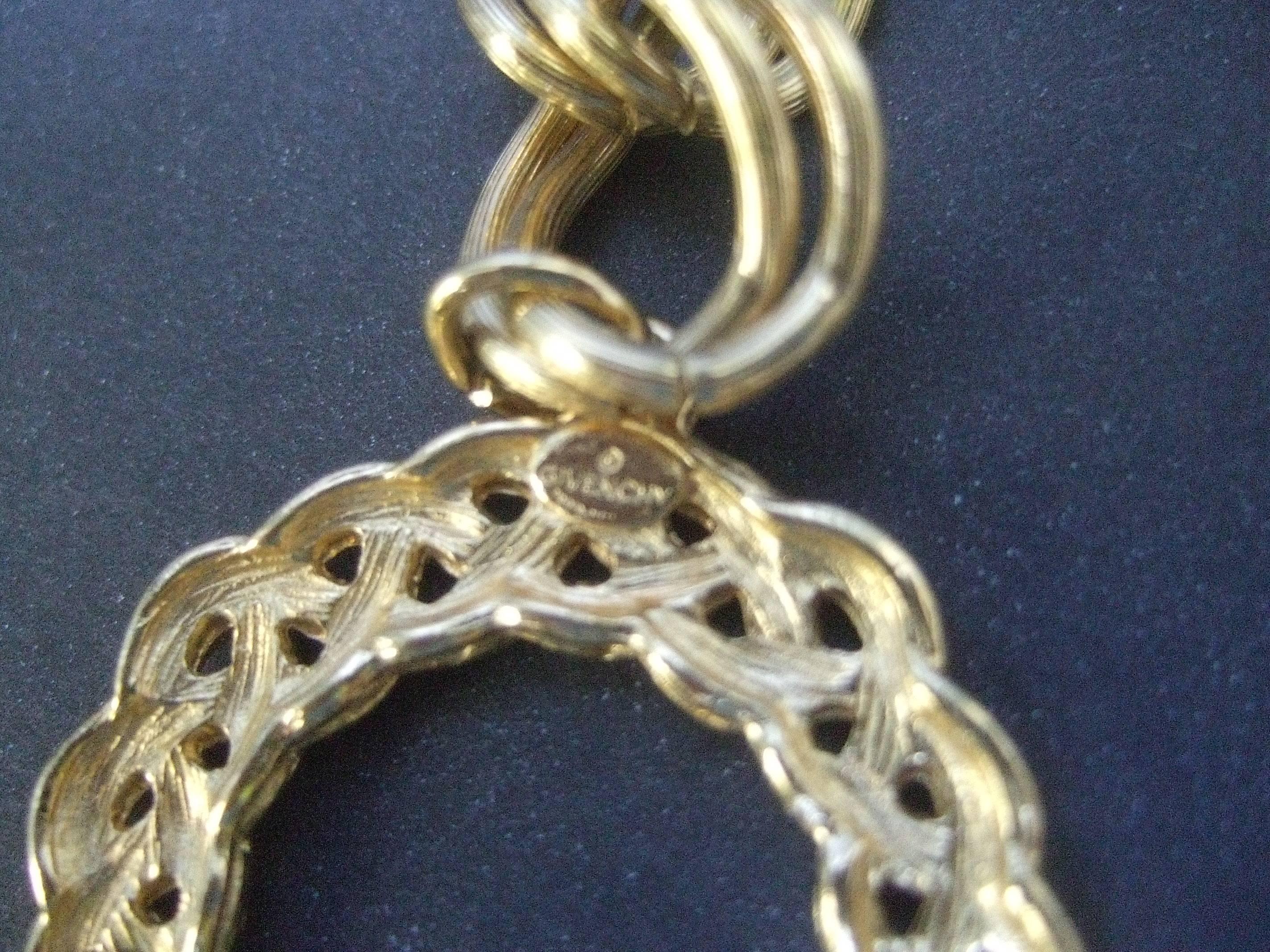 Givenchy Gilt Metal Dangling Charm Necklace ca 1980s For Sale 3