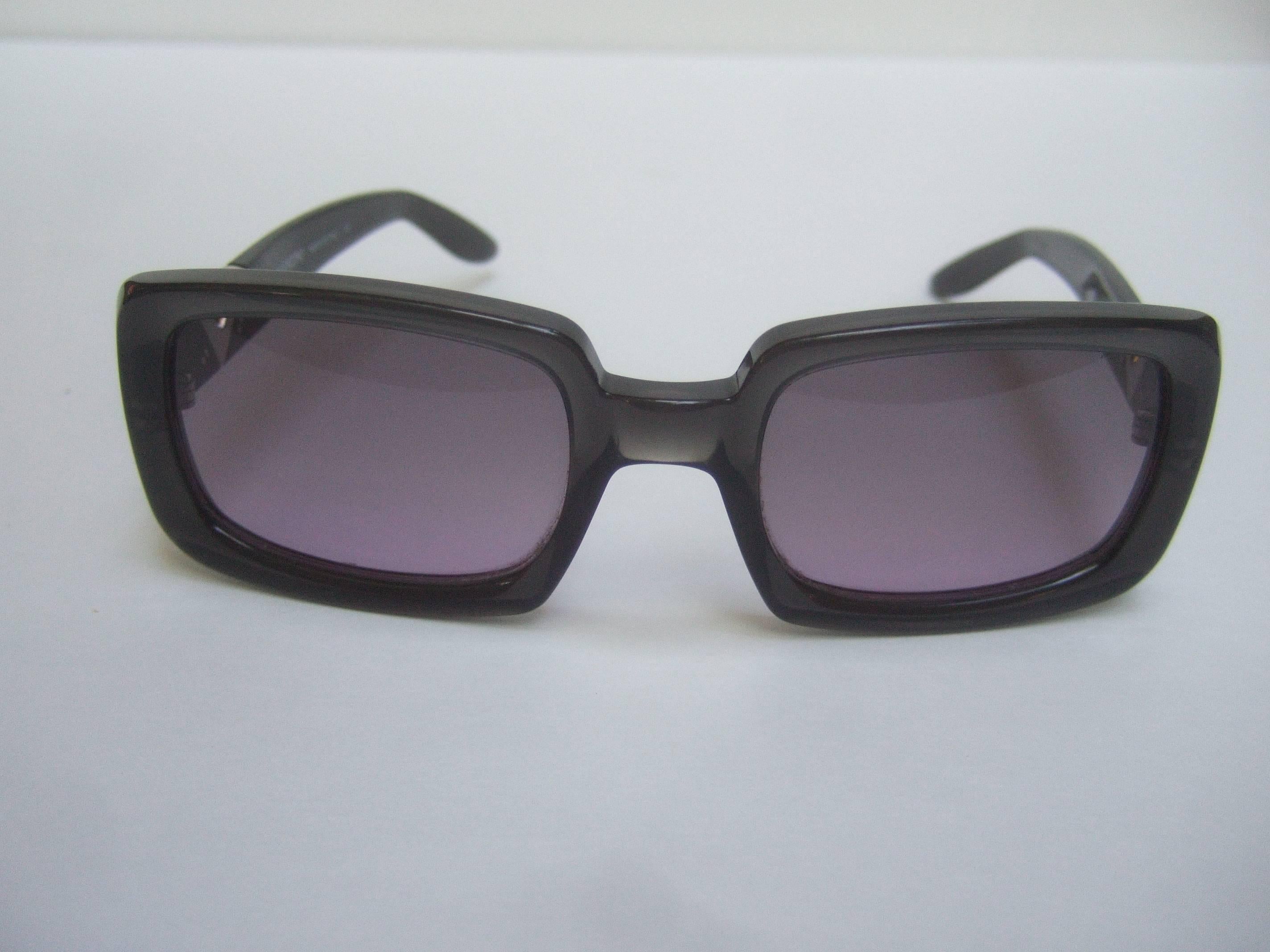 Women's Valentino Sleek Ebony Lavender Lens Sunglasses Made in Italy 