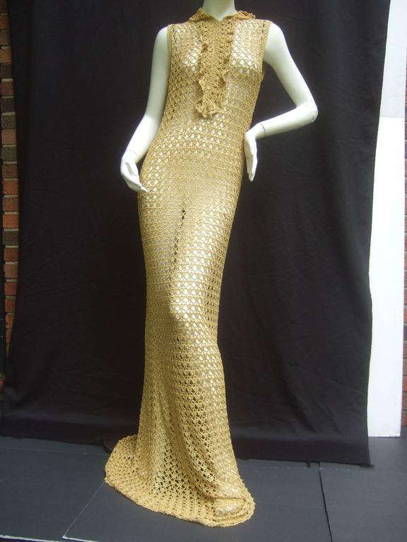 Slinky 1960's Gold Metallic Crochet Gown. at 1stDibs