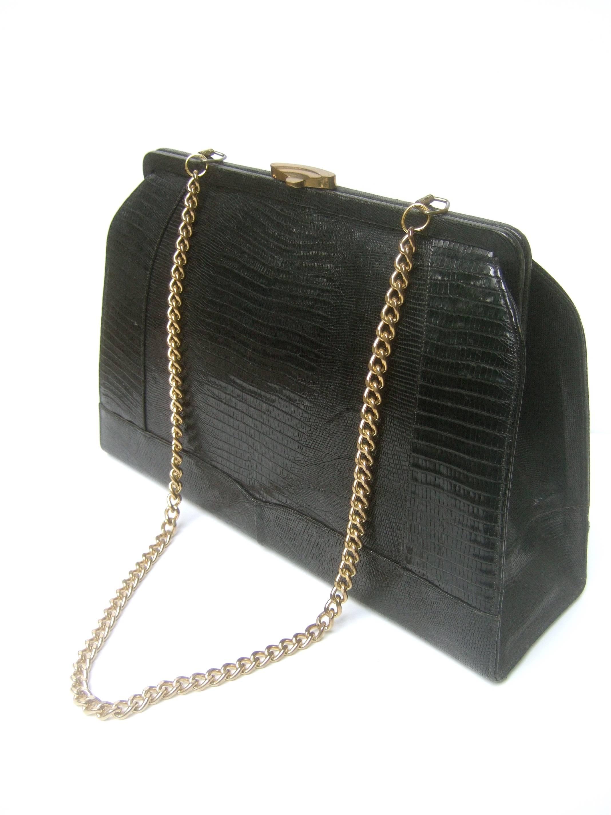 Women's Sleek Ebony Lizard Skin Structured Handbag c 1960