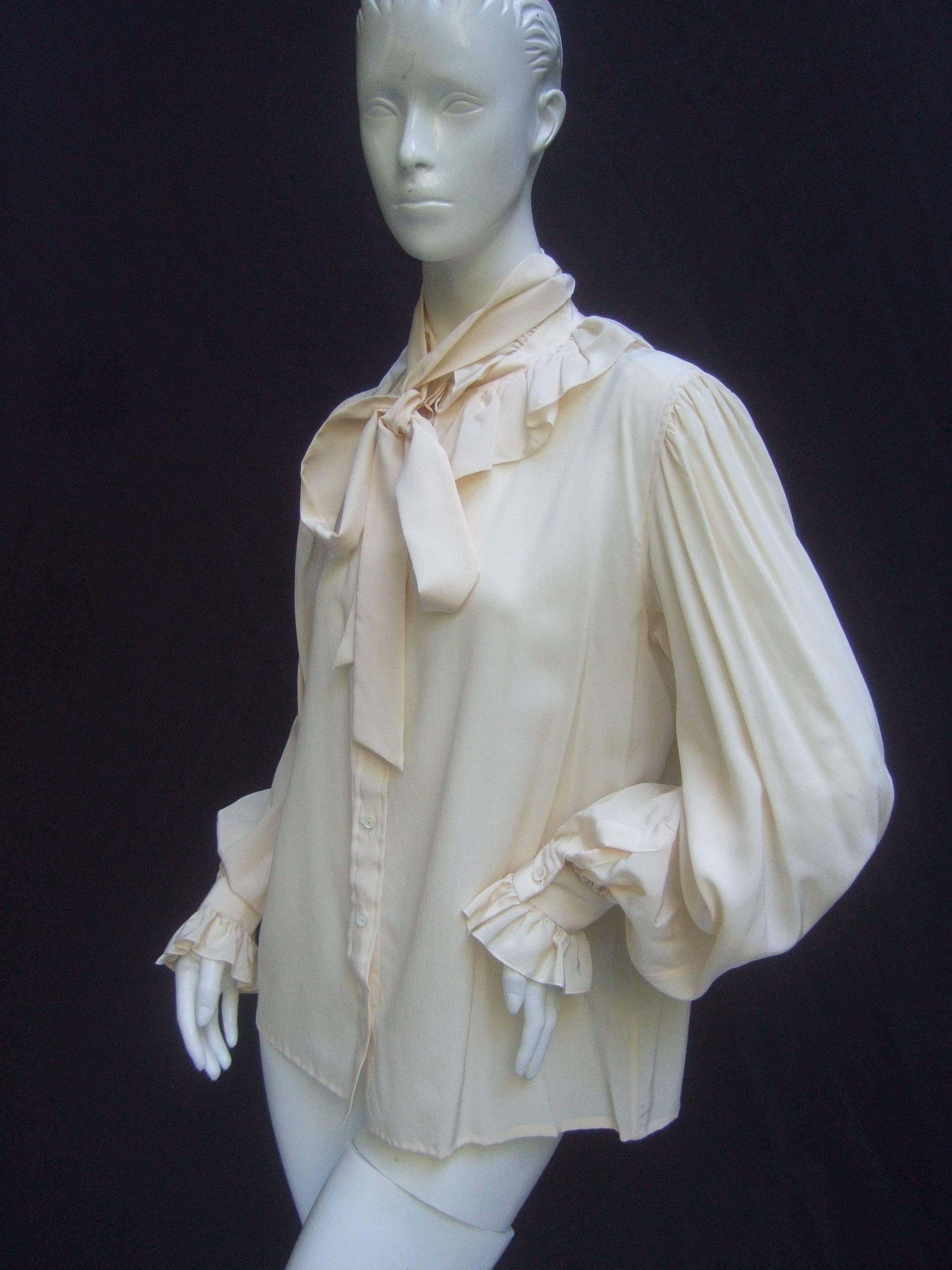 Yves Saint Laurent Rive Gauche Ivory Silk Ruffled Bow Blouse c 1970s In Excellent Condition In University City, MO