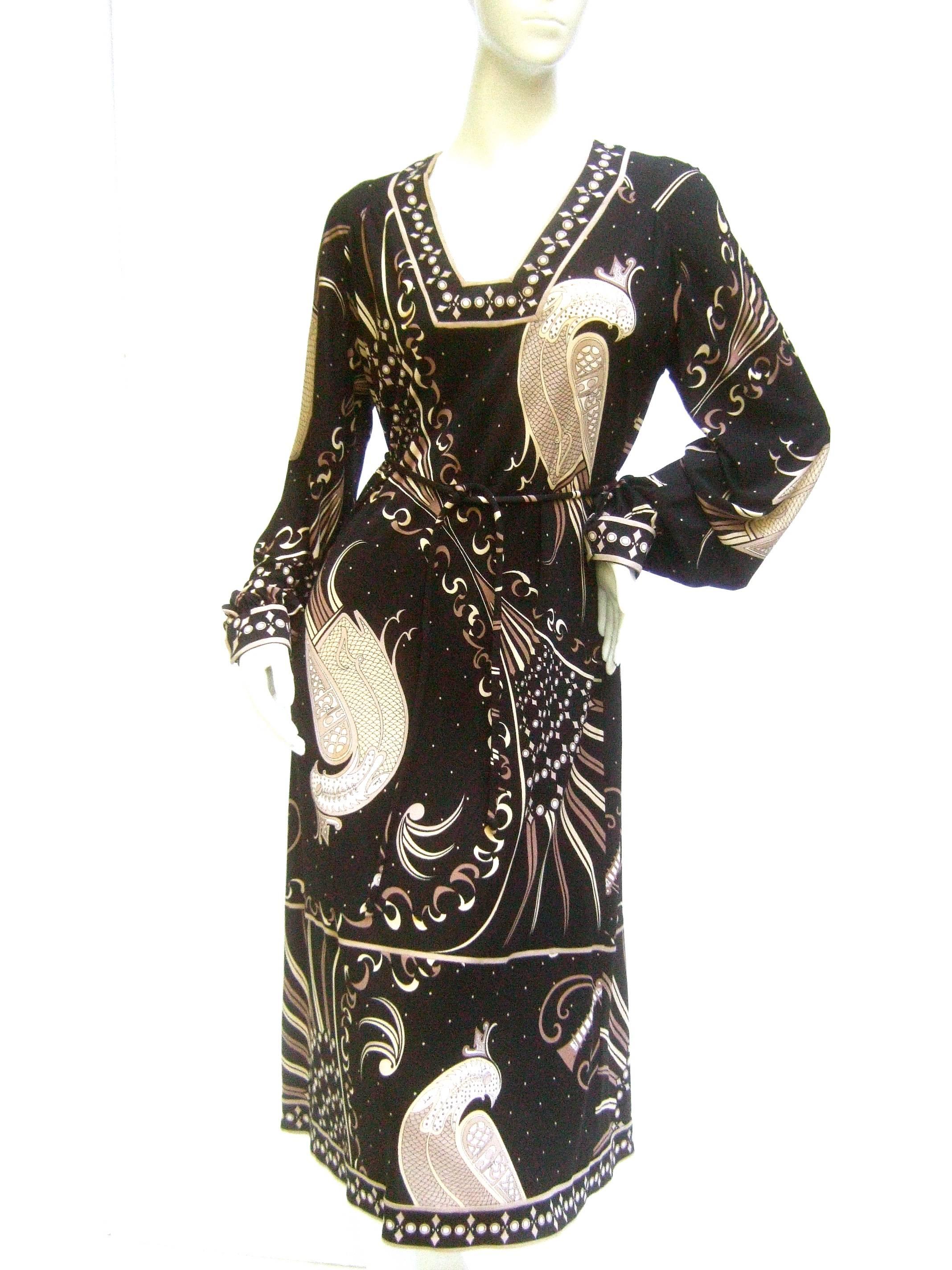 Emilio Pucci rare silk jersey birds of paradise dress 
The Italian silk jersey dress is illustrated with
a series of stylized birds with sinuous plumage 

The elegant birds graphics are illuminated 
against a stark black jersey silk