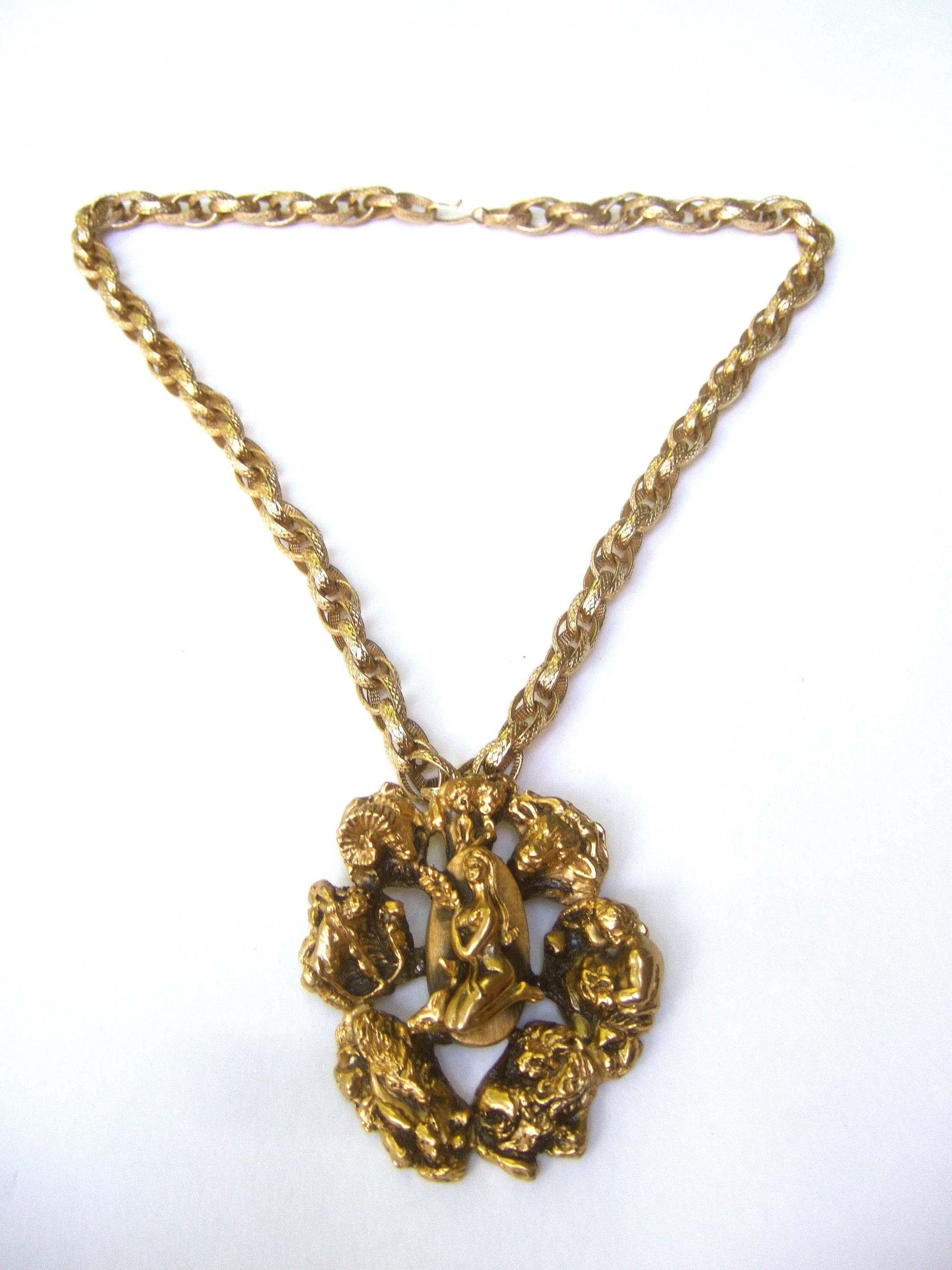 Massive Gilt Metal Virgo Zodiac Pendant Necklace c 1970s  In Excellent Condition In University City, MO