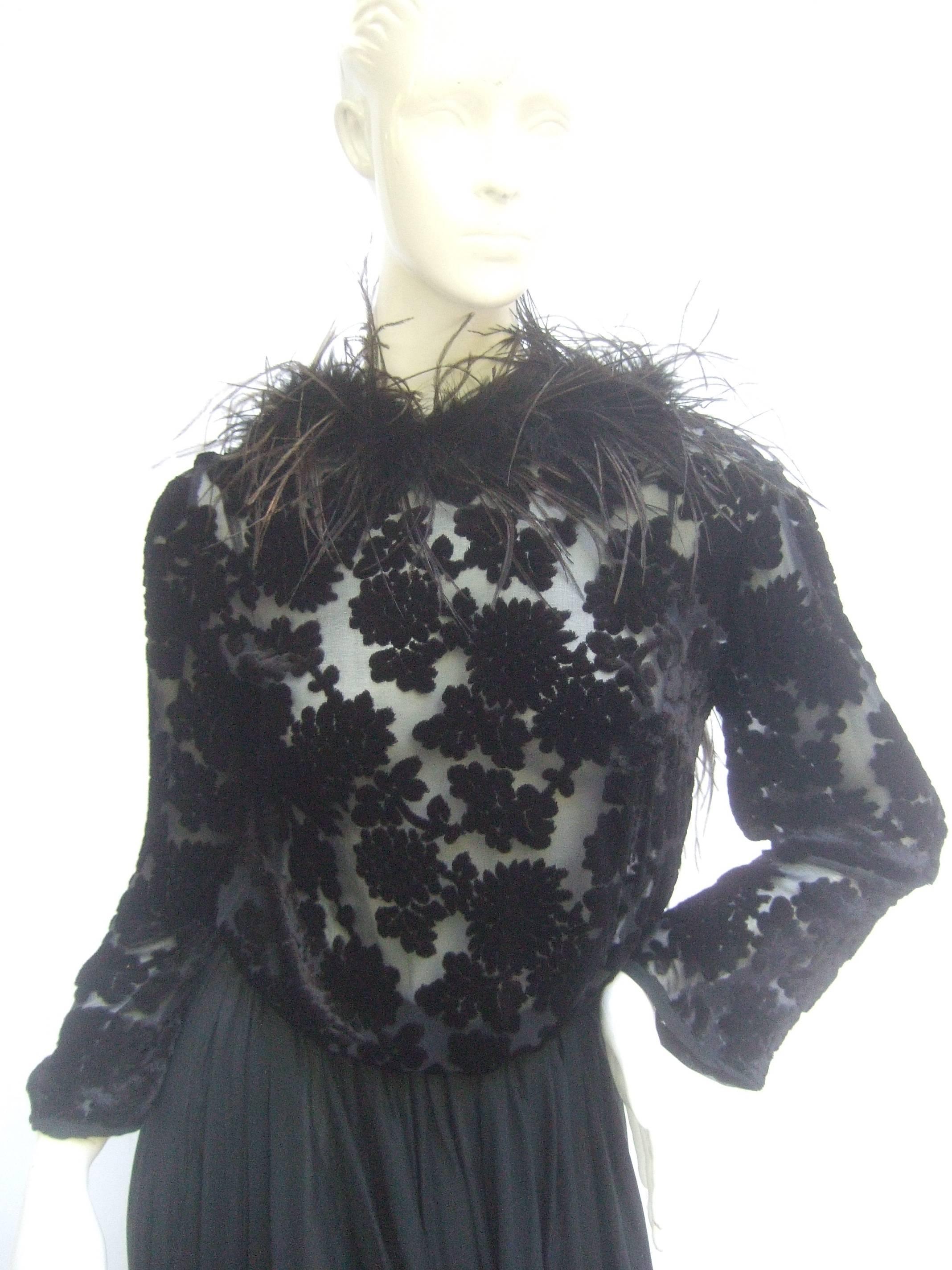 Saks Fifth Avenue Black feather trim silk chiffon devore' gown 
The elegant gown is designed with an ostrich feather collar
The bodice & sleeve are sheer illusion floral devore'

The long sweeping skirt section is sheer silk chiffon 
The voluminous
