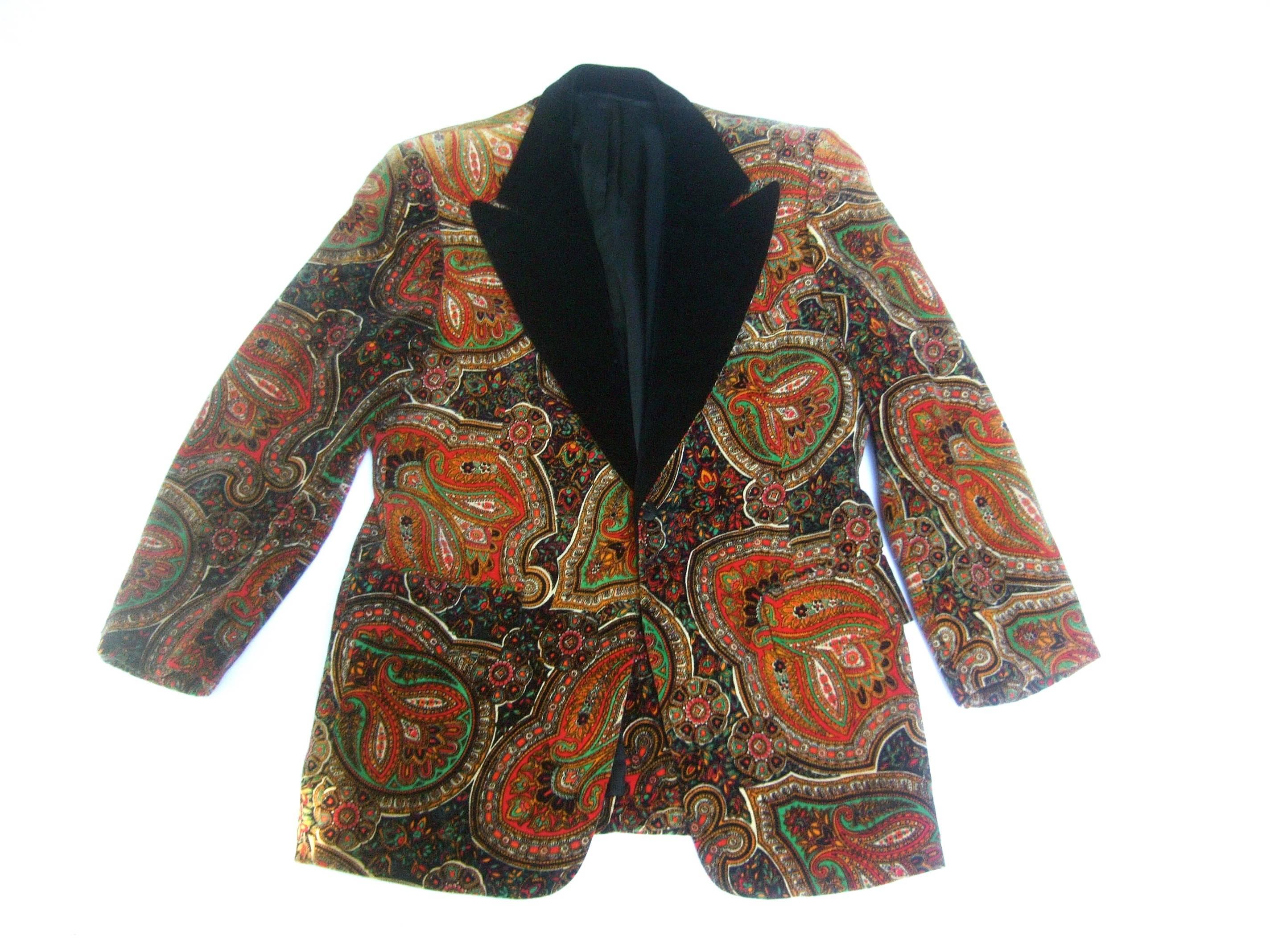 Men's Paisley cotton velvet formal jacket c 1970s
The stylish retro tuxedo style jacket is designed 
with plush cotton velvet. Accented with black
velvet lapels 

Makes an unique formal wear garment;
perfect for holidays & special