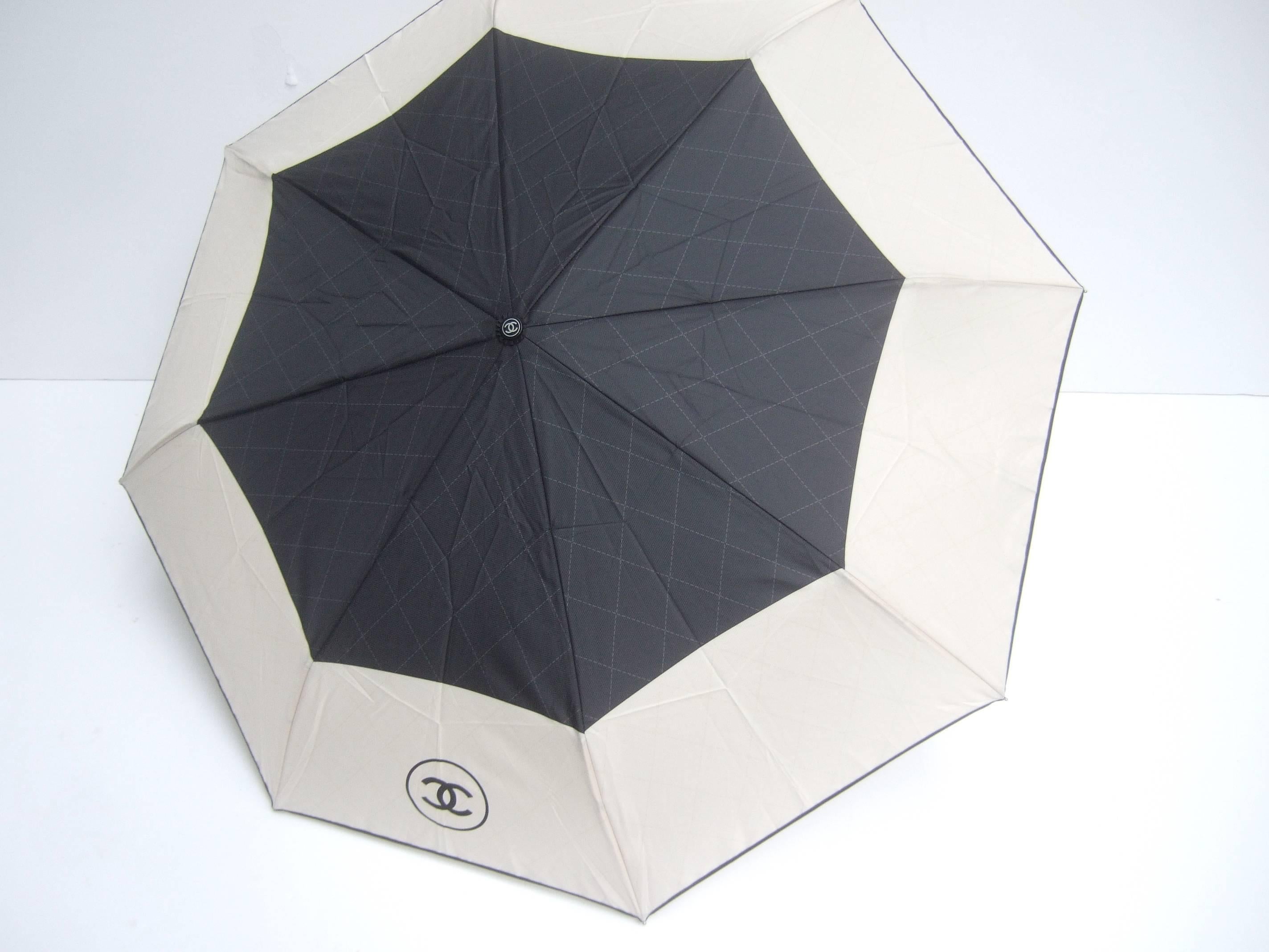 Chanel Stylish Black and Ivory Nylon Umbrella in Chanel Box In New Condition In University City, MO