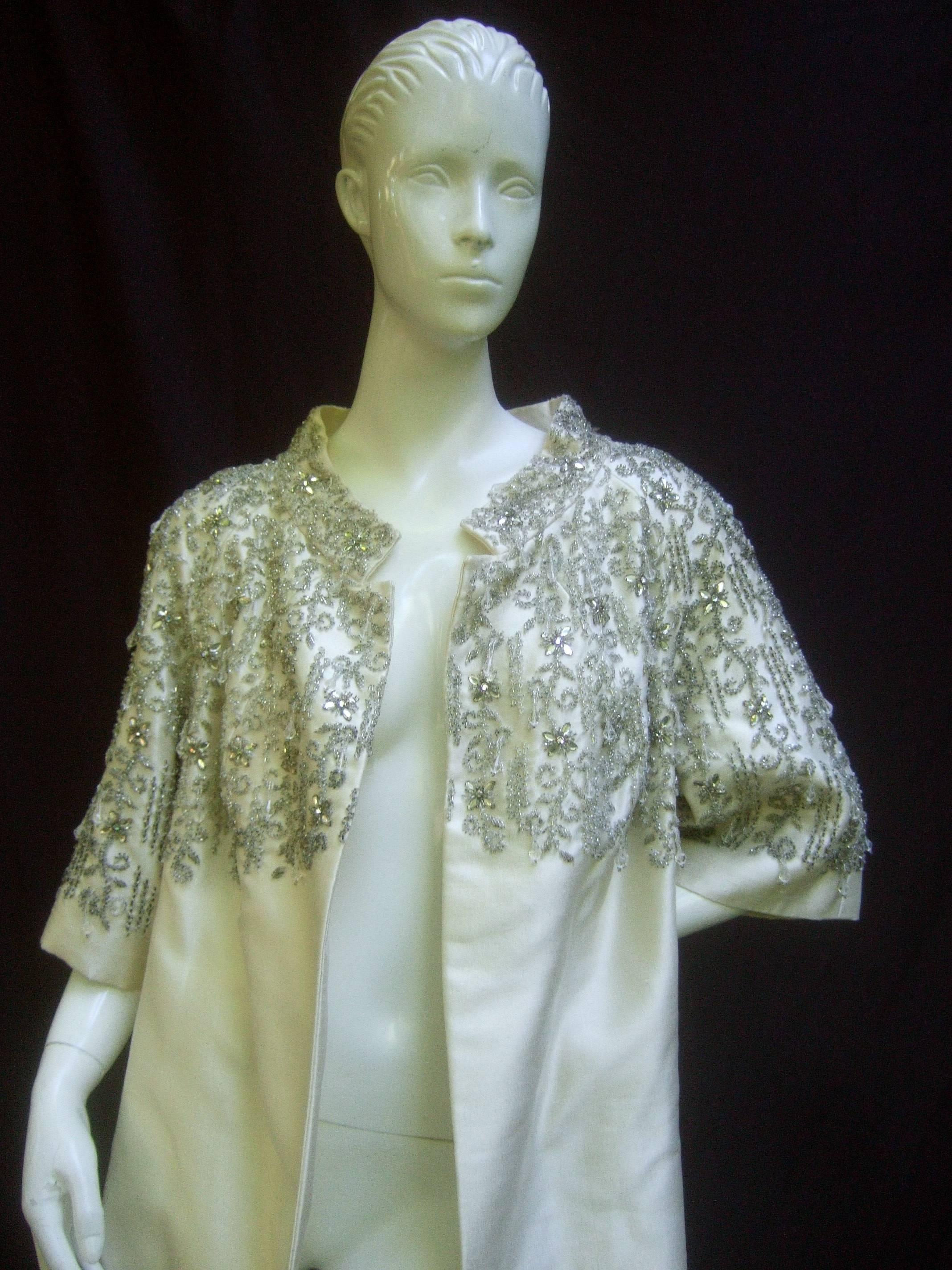 Exquisite Oyster Silk Shantung Crystal Beaded Opera Coat c 1960 In Fair Condition In University City, MO