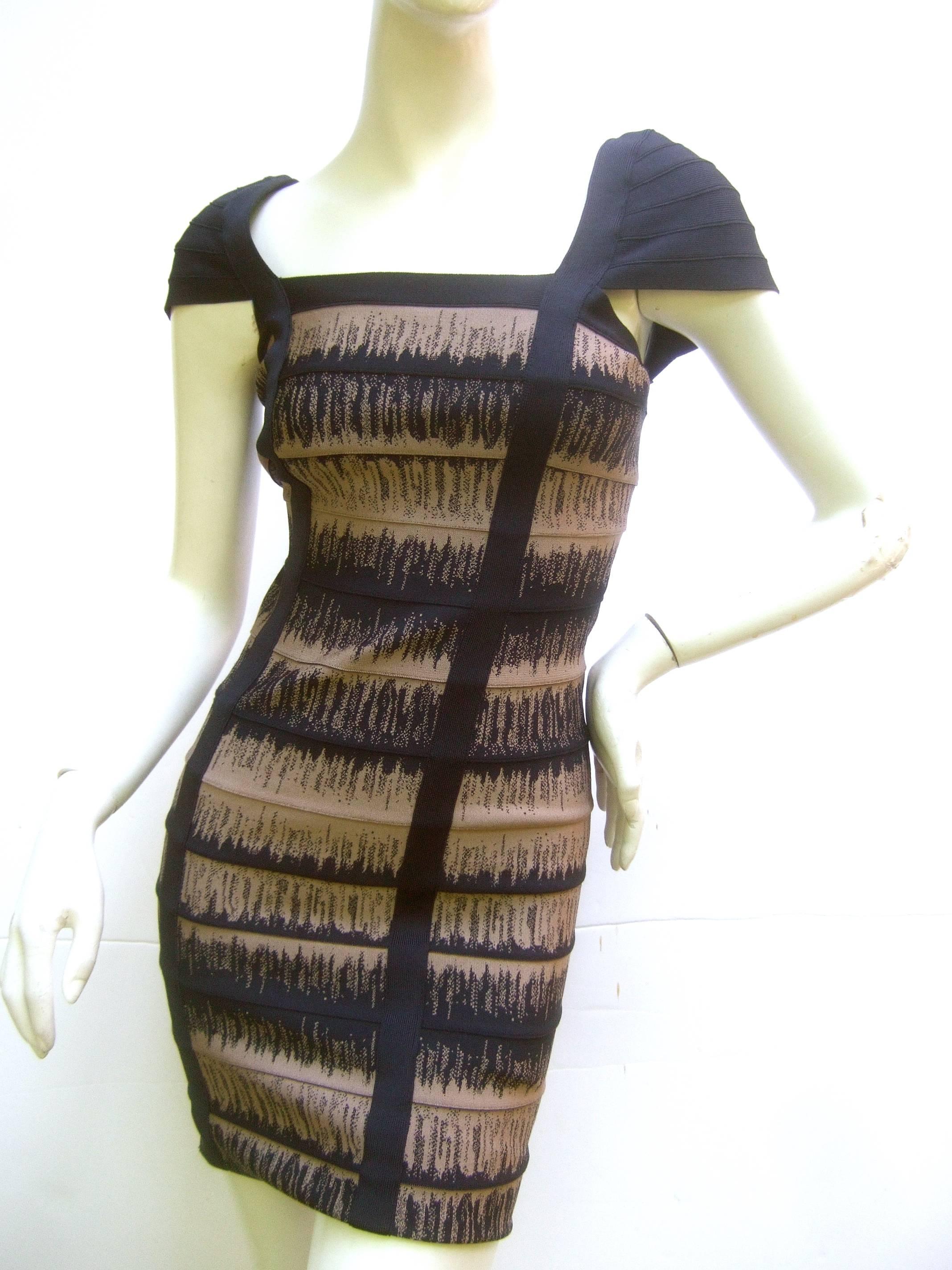 Herve Leger Iconic knit bandage dress Size S 
The sexy dress is designed with his signature 
clingy knit horizontal bands with contrasting  
horizontal bands 

The knit bands are a combination of dark blue and
beige designs. The shoulders are