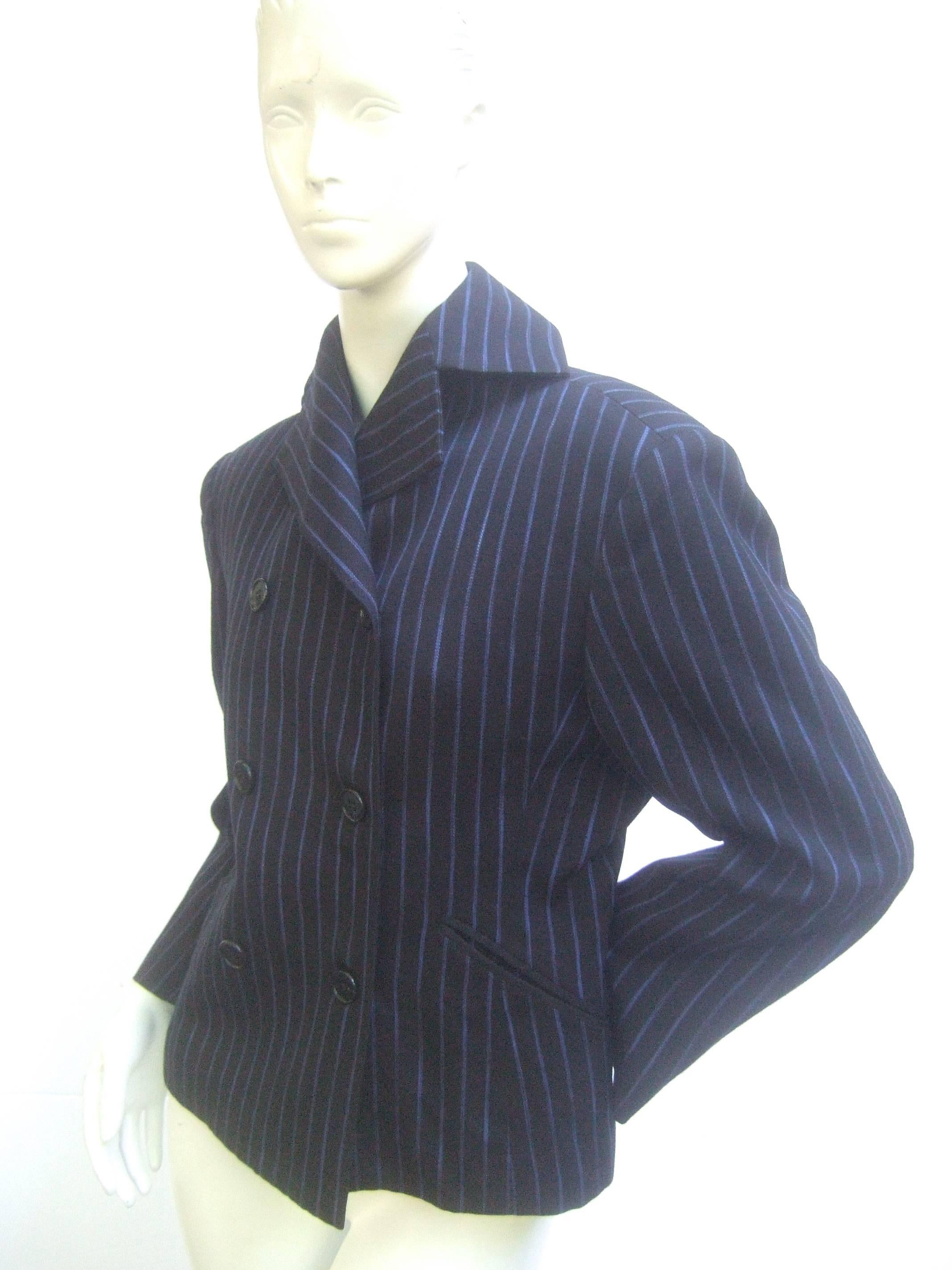 Issey Miyake Women's pin striped double breasted wool jacket Size Small 
The classic wool jacket is designed with medium weight black Laine
wool juxtaposed with lapis blue wide pin stripes  

Designed with six black lucite buttons that run down the