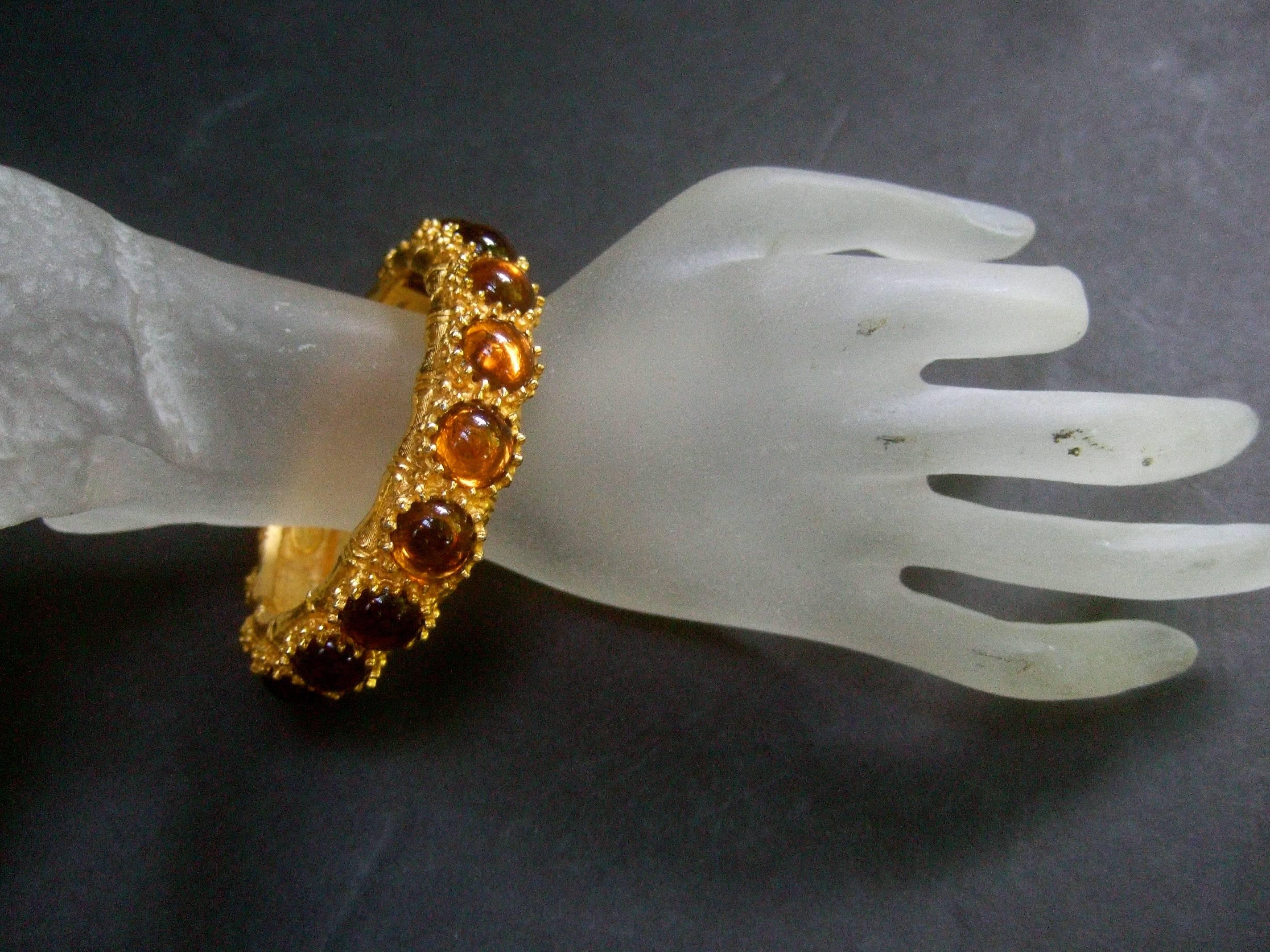 Ken Lane Amber Glass Cabochon Gilt Metal Bracelet c 1970 In Excellent Condition For Sale In University City, MO