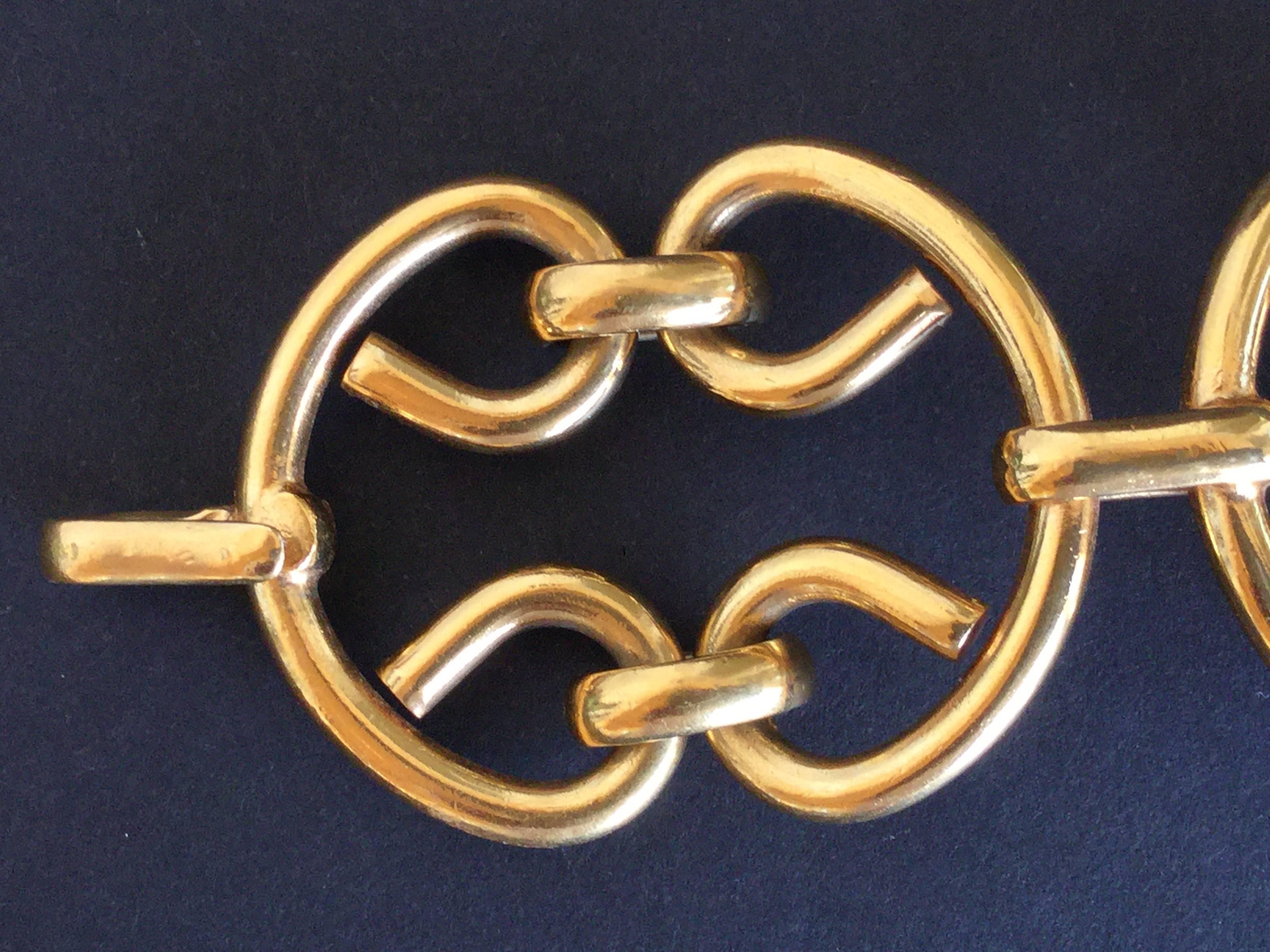 These older Chanel pieces just feel nothing like the newer ones! This gilt link bracelet is so solid and heavy. The gilding is quiet and restrained. Burnished instead of flashy like newer pieces can be. Simple but striking design dating from the